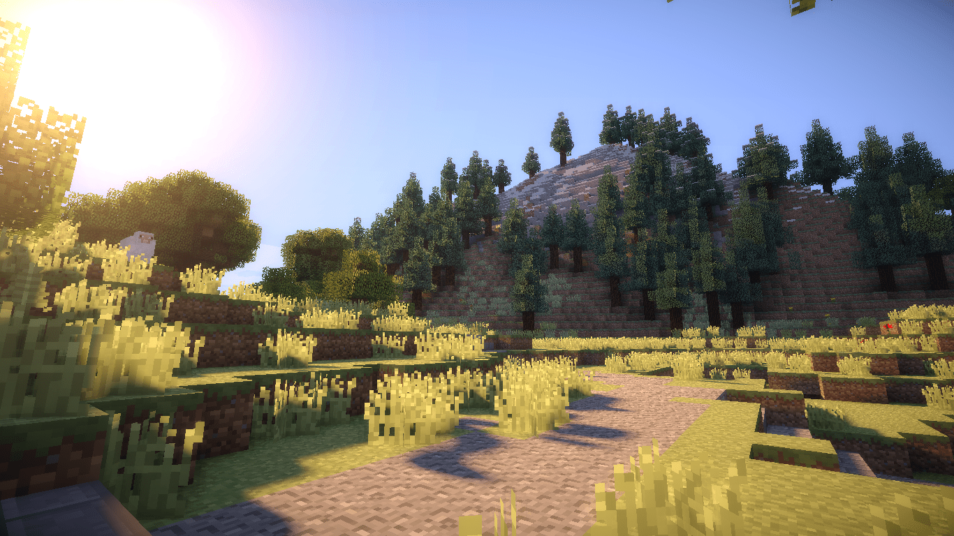 A Minecraft screenshot of a sunny forest with a mountain in the background - Minecraft