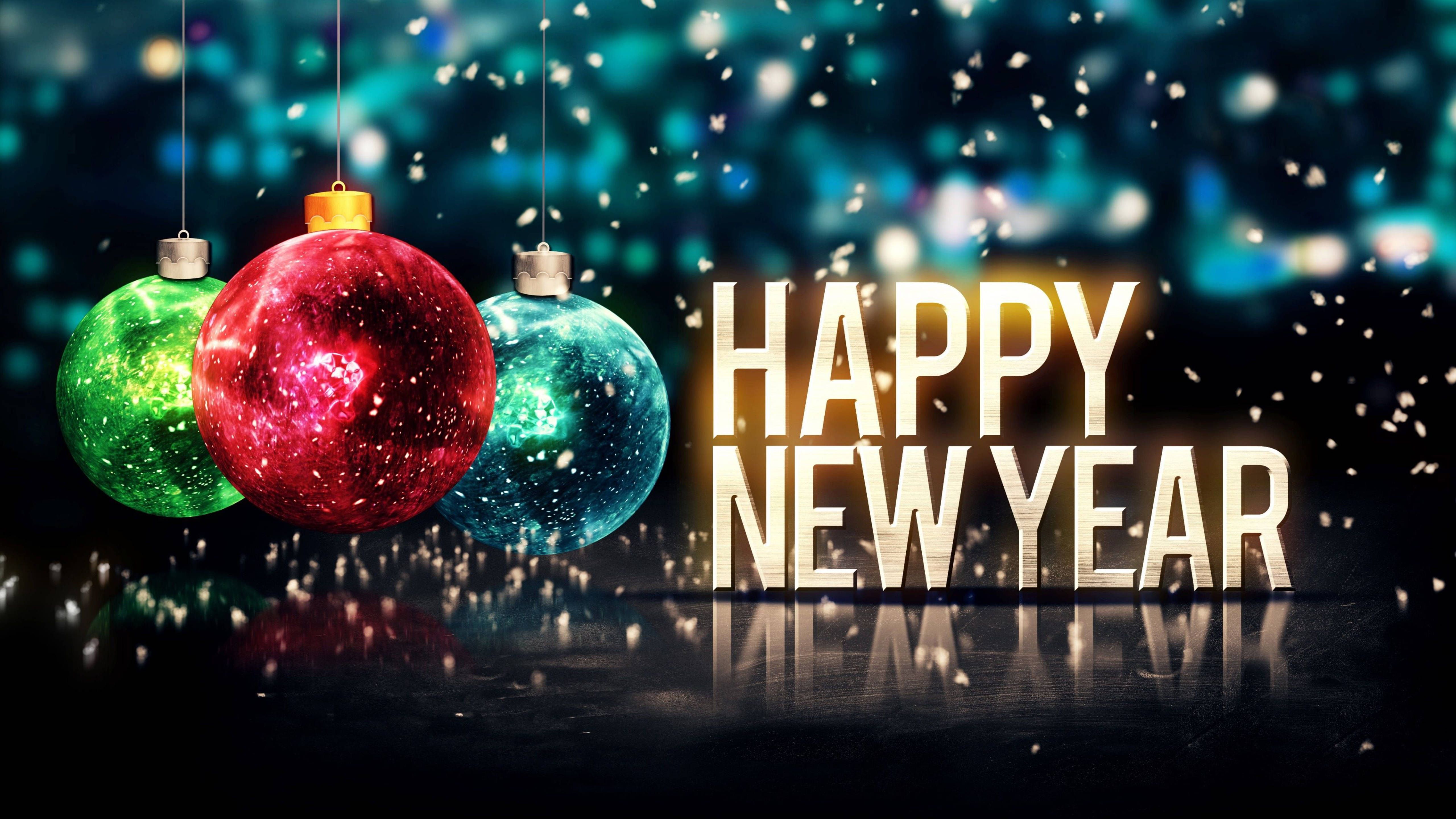 Happy New Year 3D wallpaper with shiny baubles and falling snow on a city lights background - New Year
