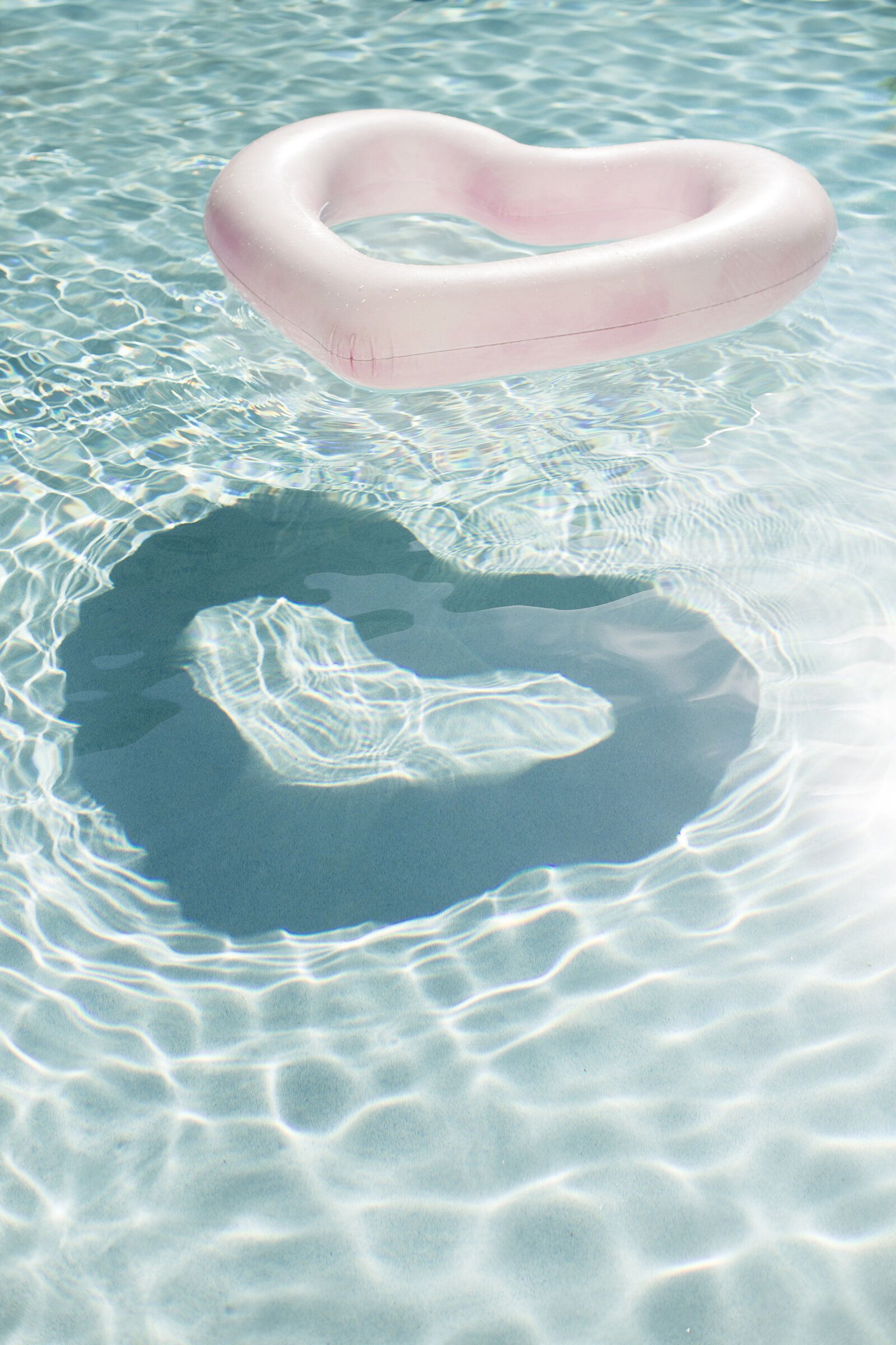 A heart shaped float in the water - Bright