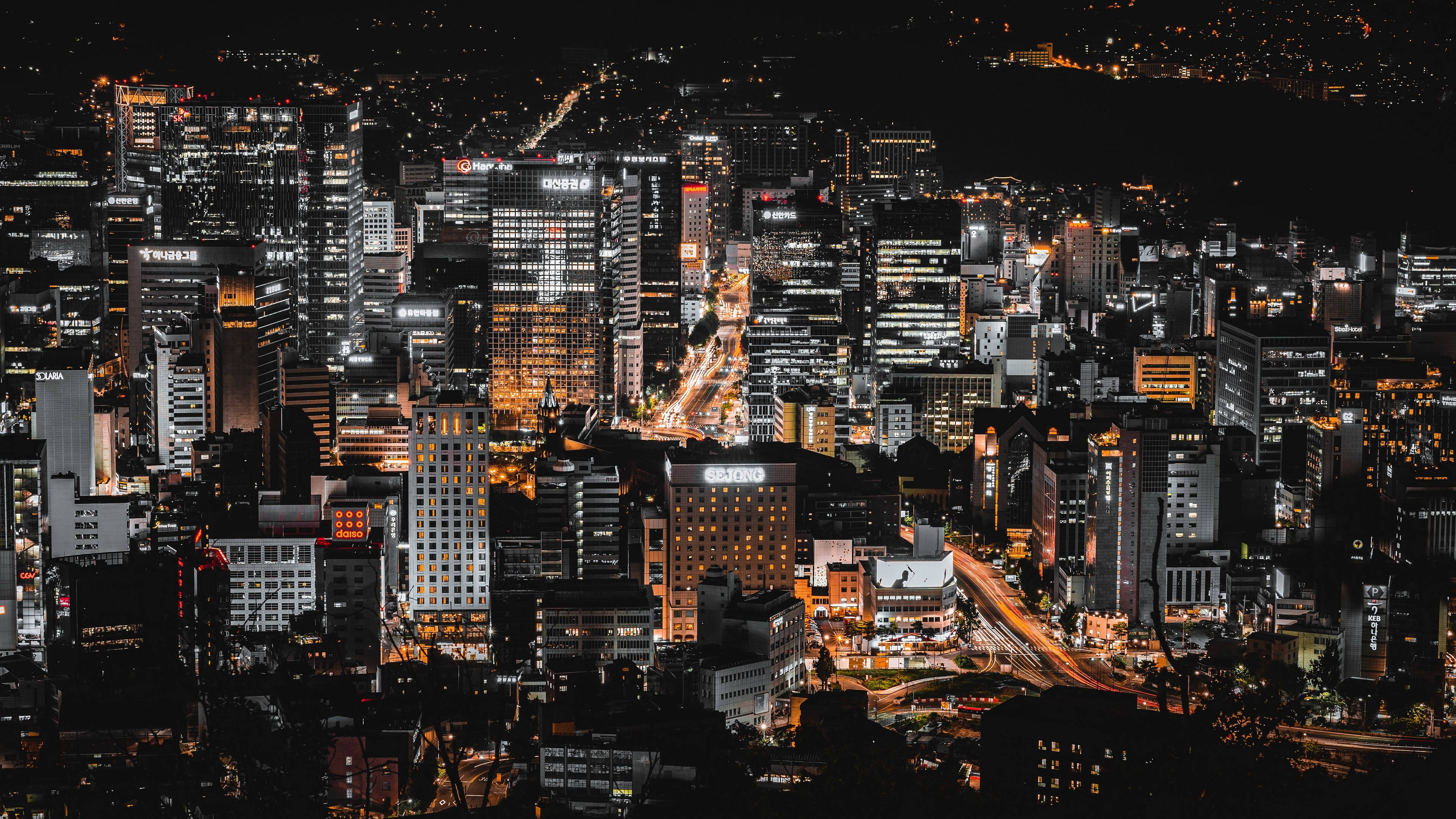 A city at night with many lights on - Night, cityscape, Seoul