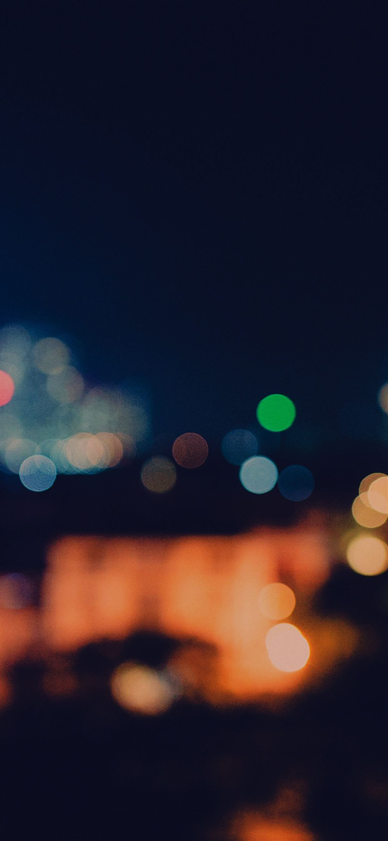 Bokeh lights in the night city wallpaper 1242x2688 for iPhone X - Night
