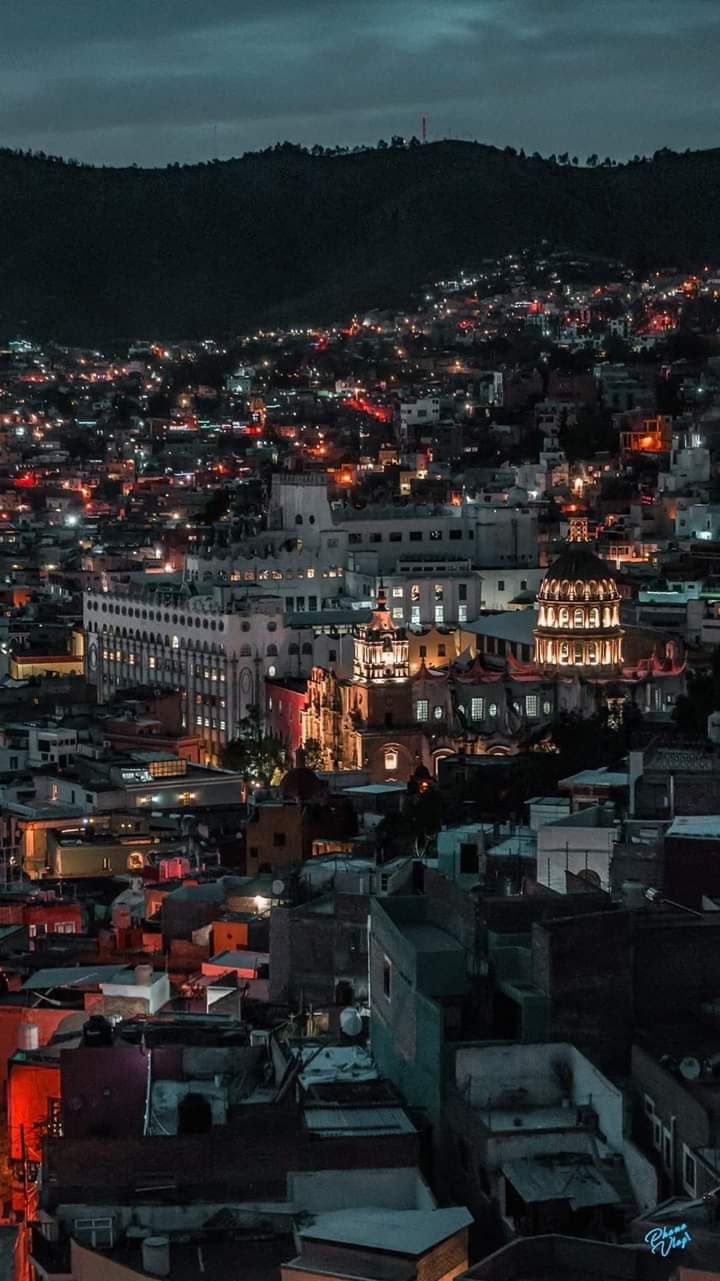 A city at night with many lights on - Mexico