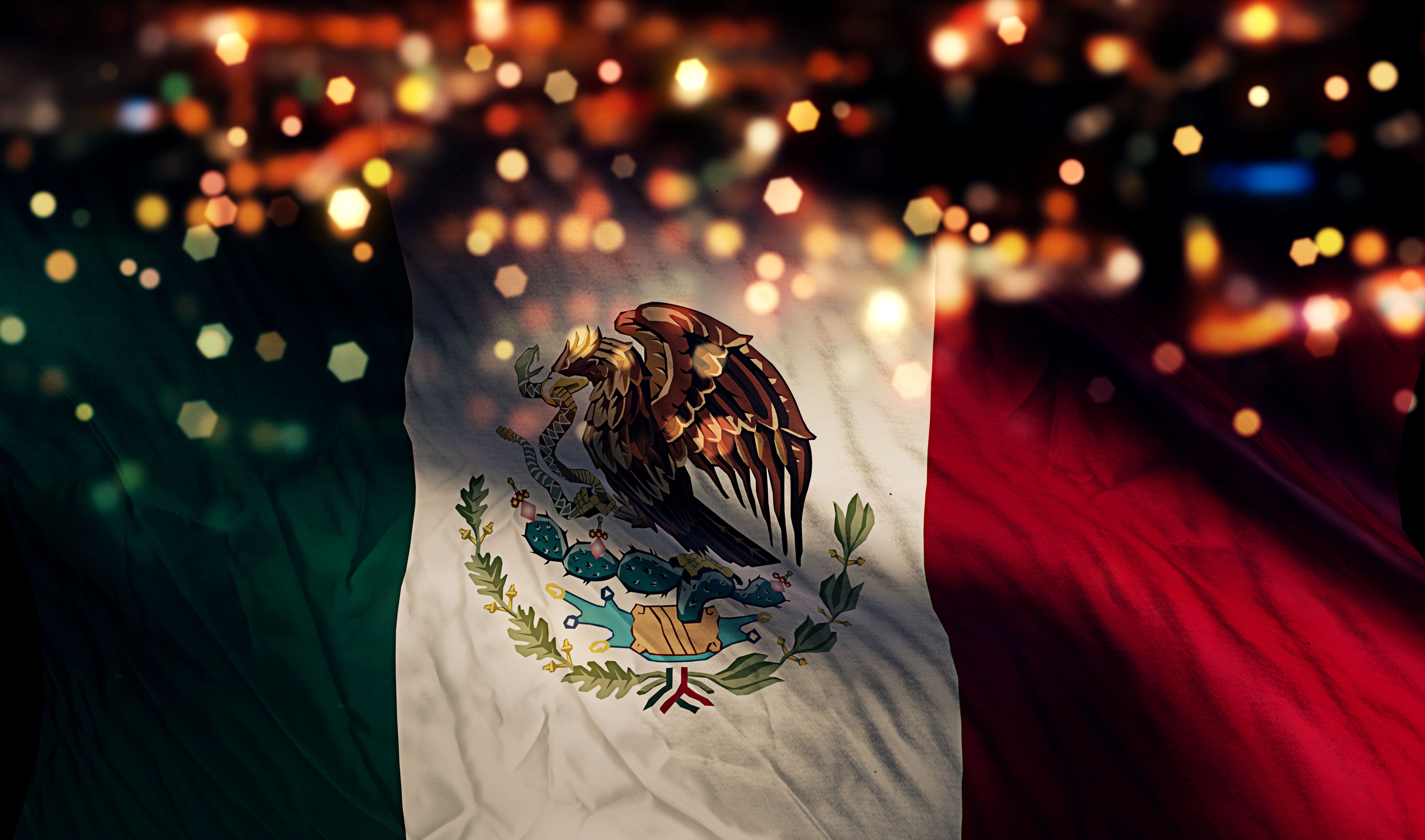 Mexico flag against a city night background with bokeh - Mexico