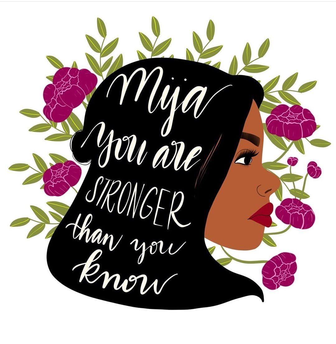 A black woman with long hair and flowers behind her head with the words 