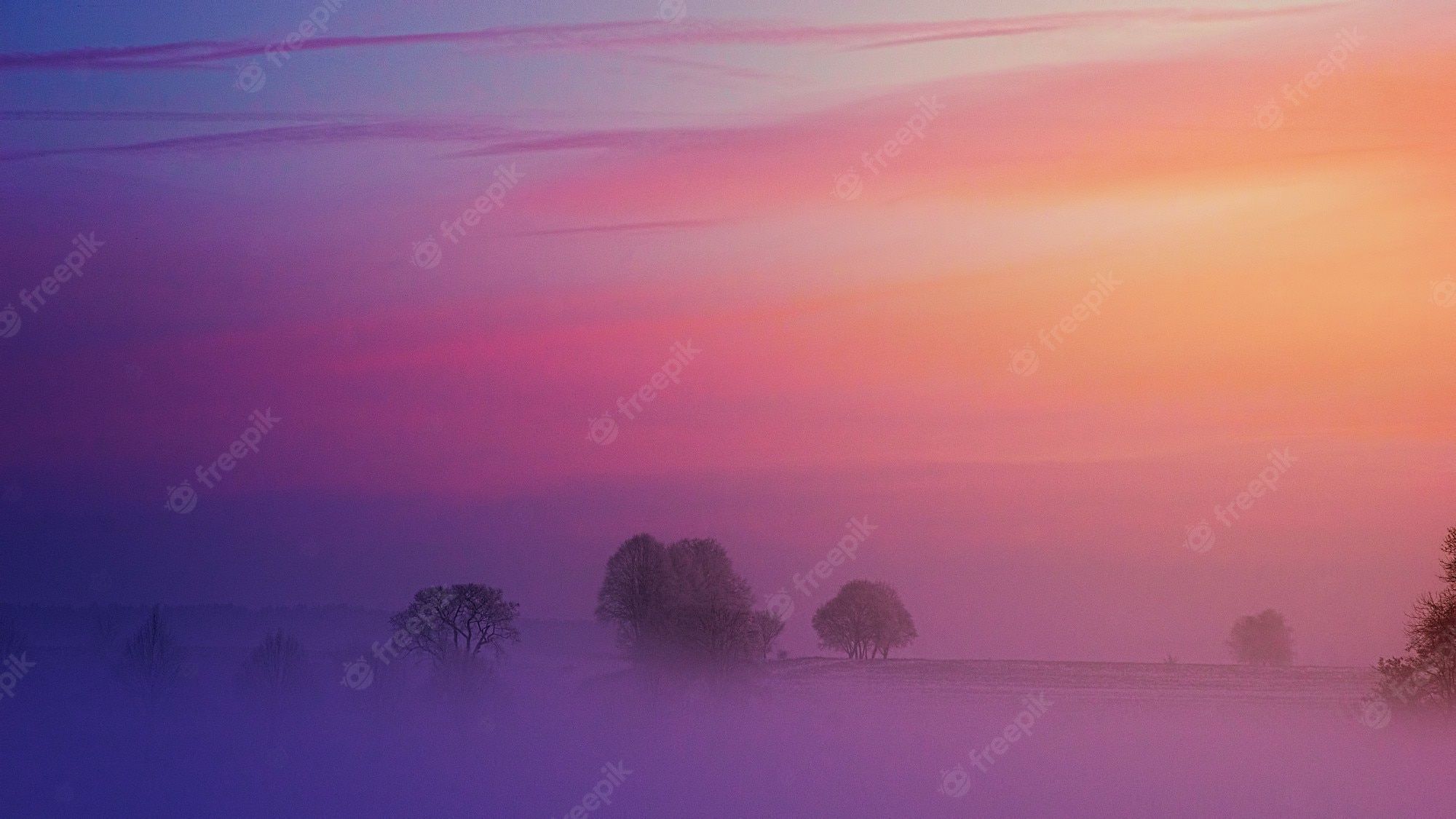 A sunset over the foggy landscape - Landscape