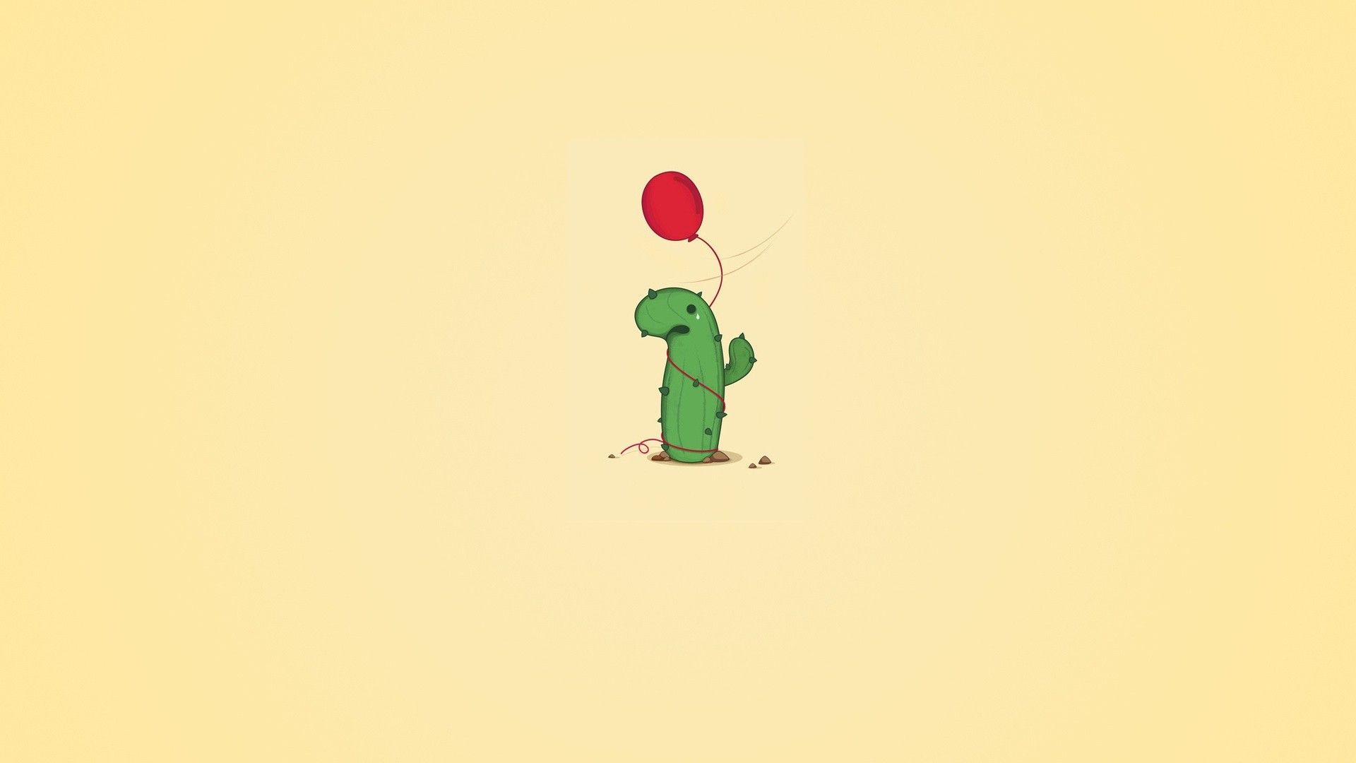 A cute cactus holding a red balloon - Cactus
