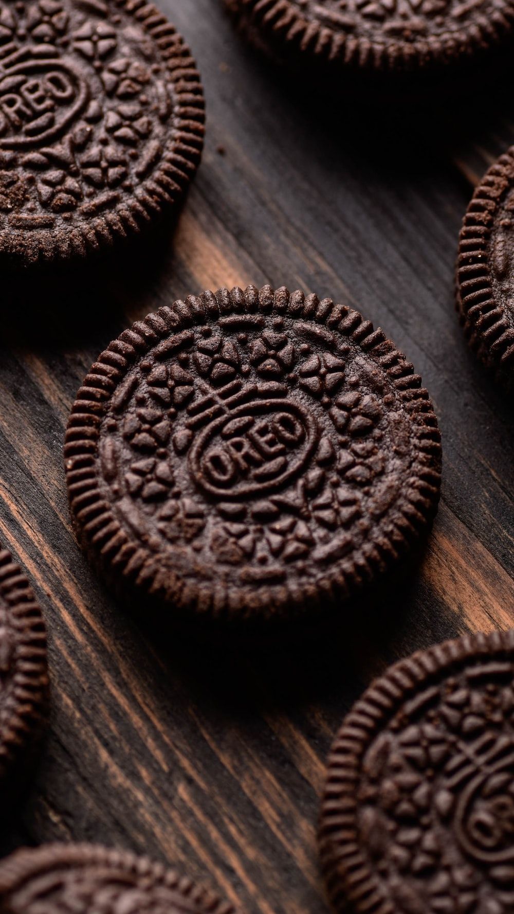 Chocolate sandwich cookies on a wooden table - Oreo