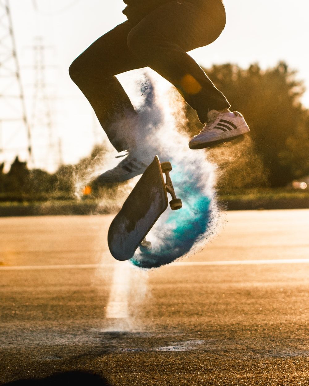 A skateboarder performing a trick in the air - Skate, skater