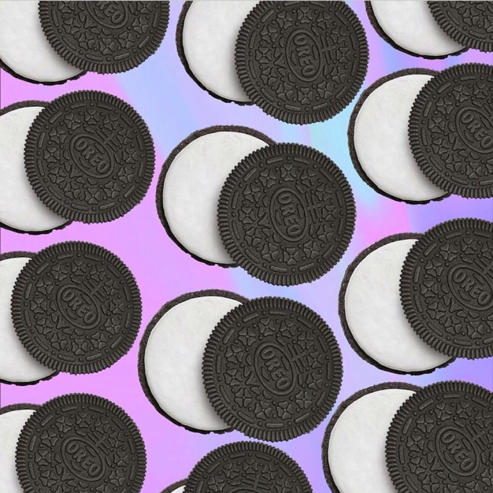 A pattern of Oreo cookies on a pink and purple background - Oreo