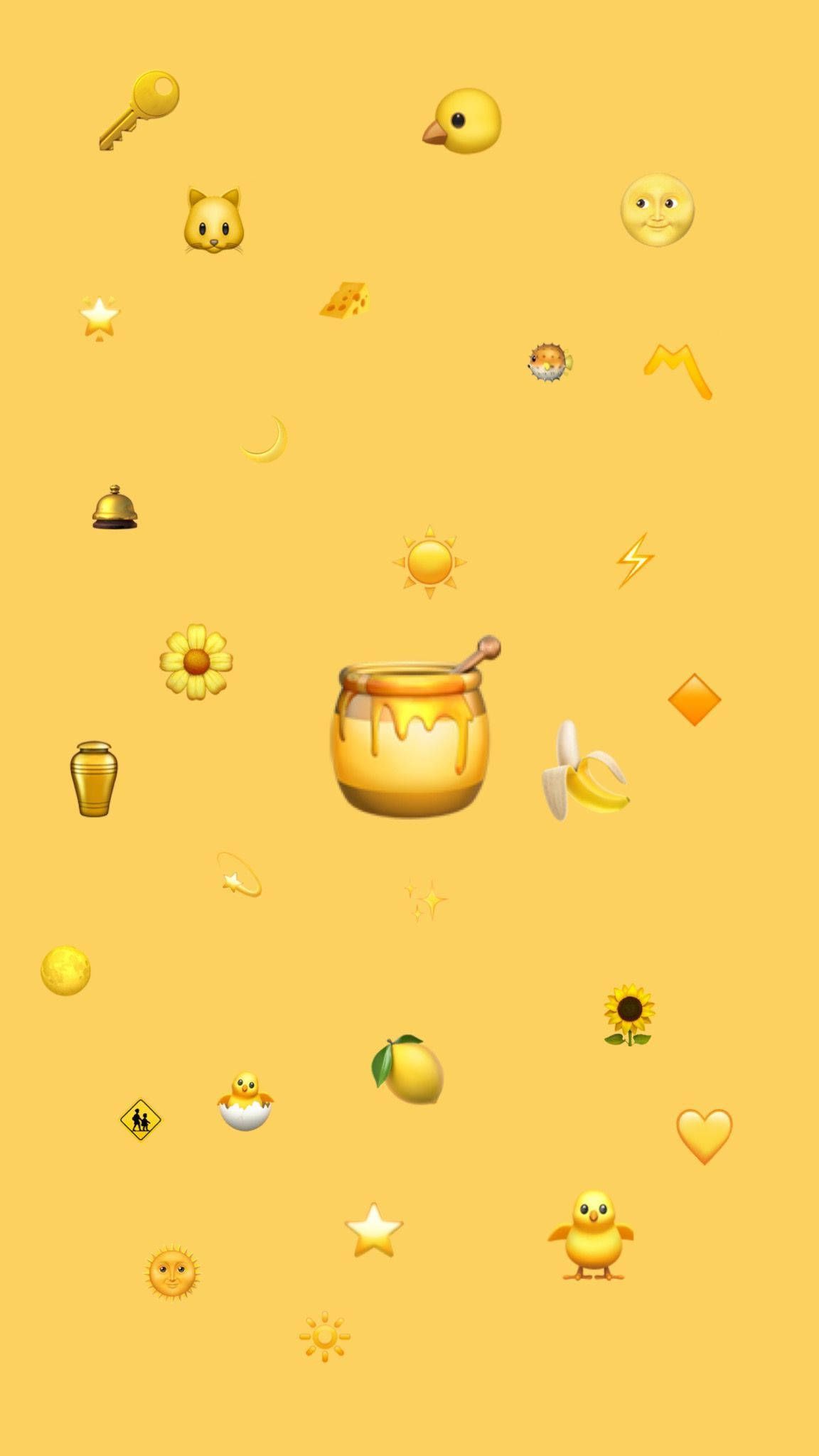 A yellow background with various round objects - Emoji