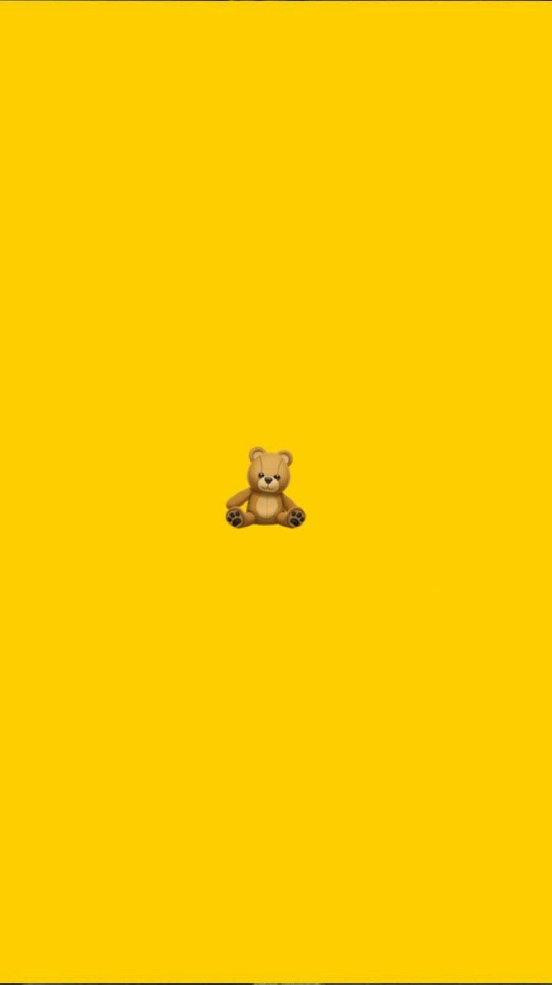 A teddy bear emoji on a yellow background - Emoji