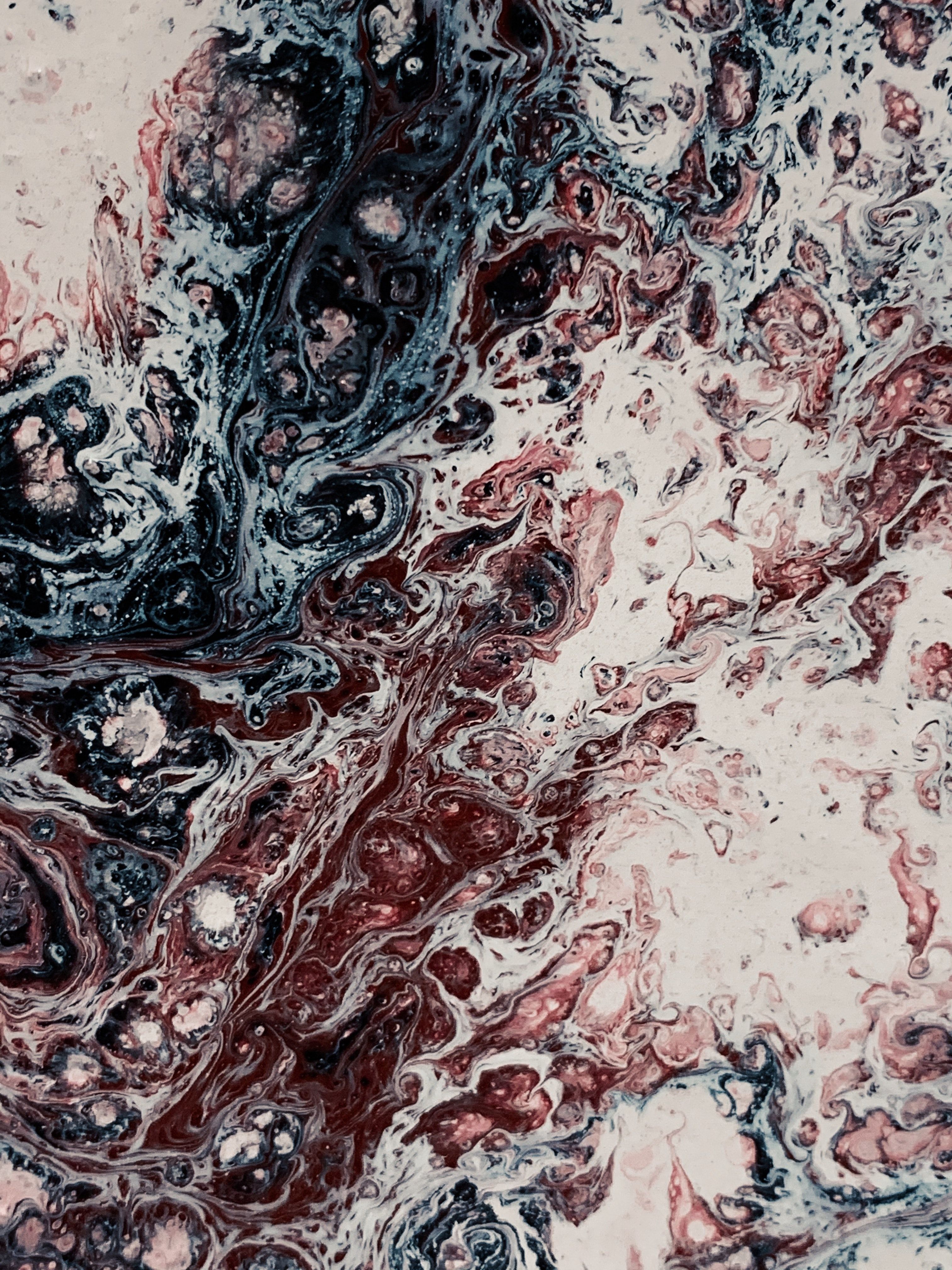 A photo of a painting with red, white, and black paint. - Abstract, pattern