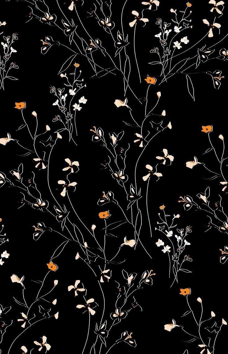 A black background with white and orange flowers - Pattern