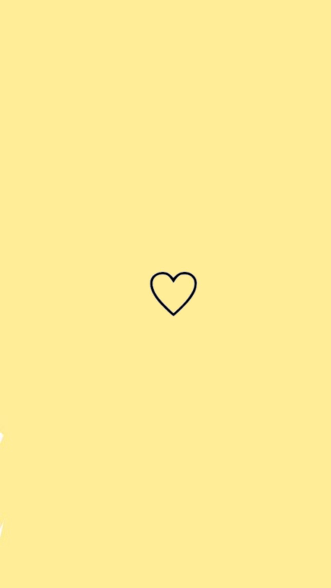 A simple yellow background with a black heart in the middle - Yellow iphone
