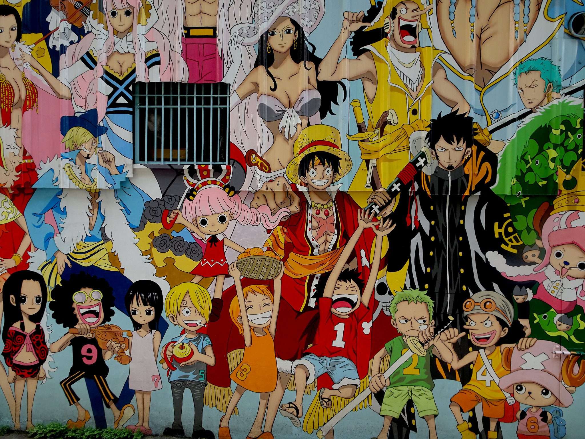 One Piece characters on a wall - 90s anime