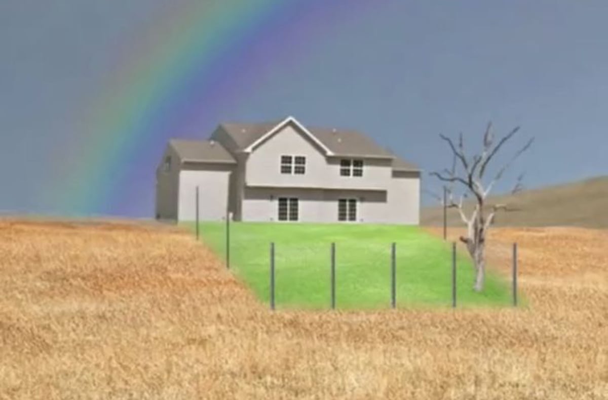 A rainbow arches over a house on a hill. - Weirdcore
