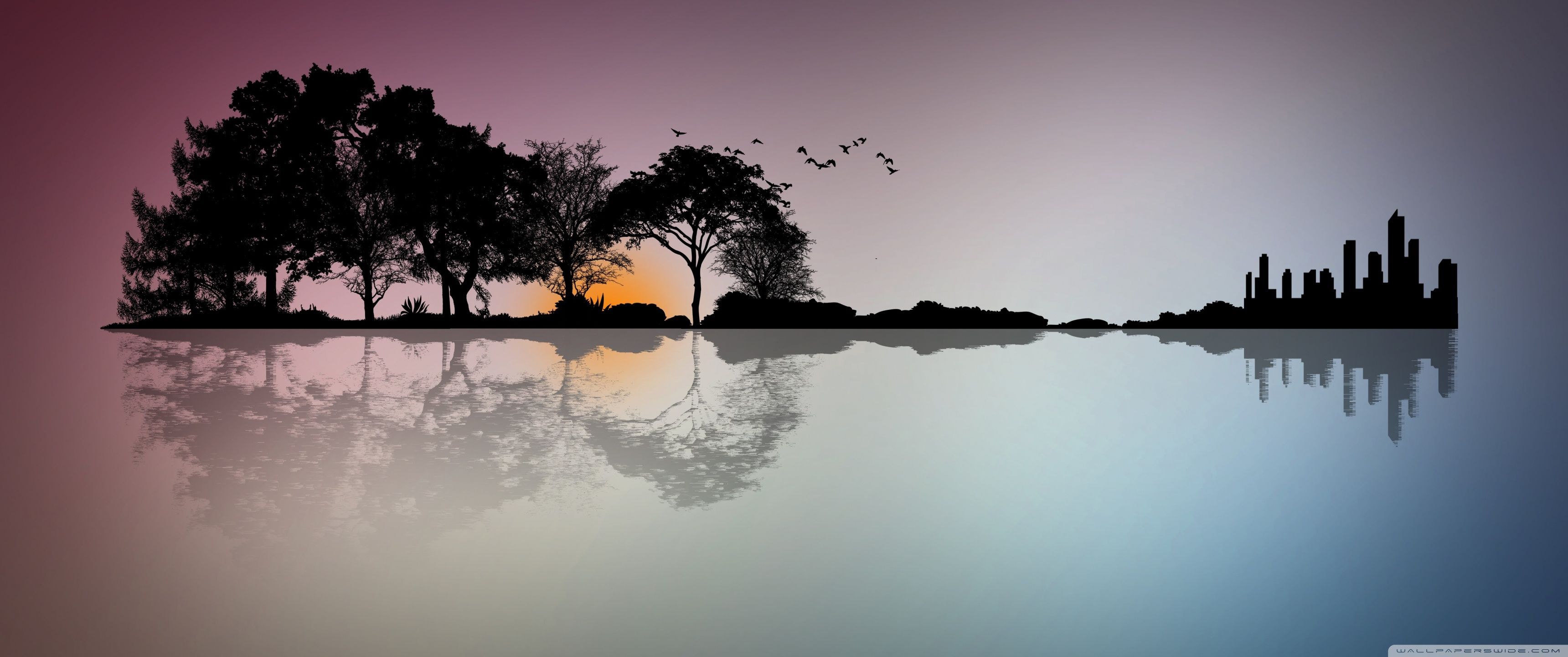 A sunset scene with trees and water - 3440x1440, skyline