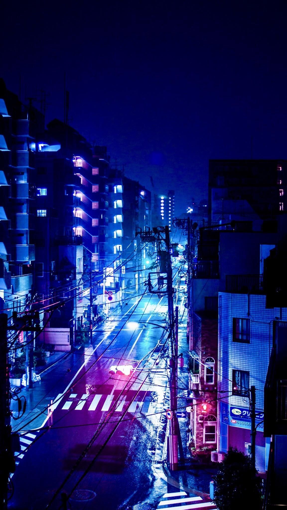 Aesthetic wallpaper for phone of a city street at night - Anime city