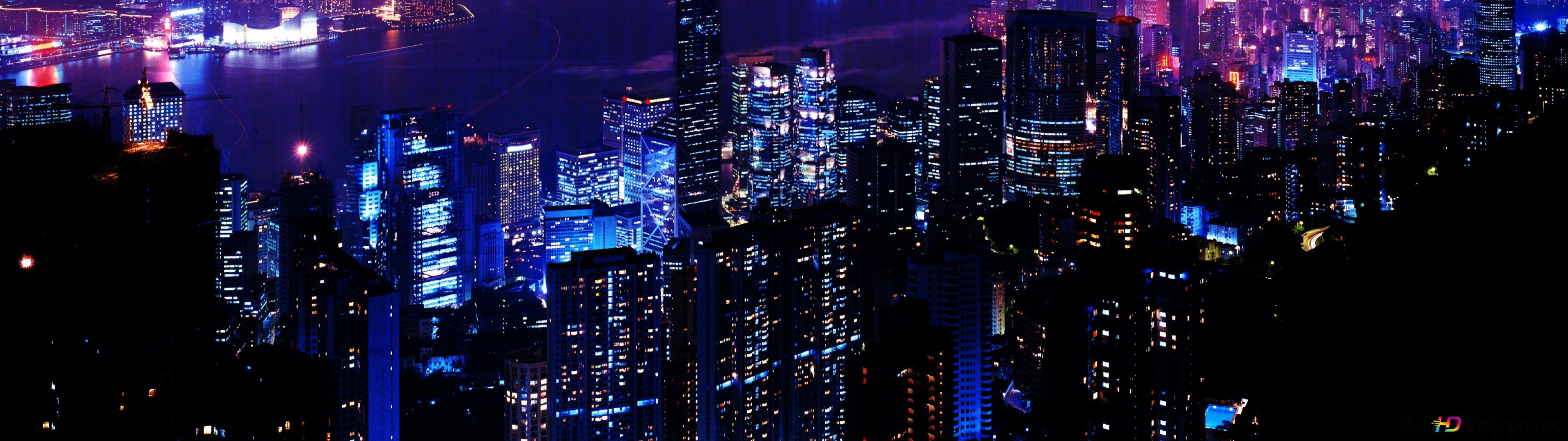 A city at night with skyscrapers lit up in blue and purple lights. - Anime city, city