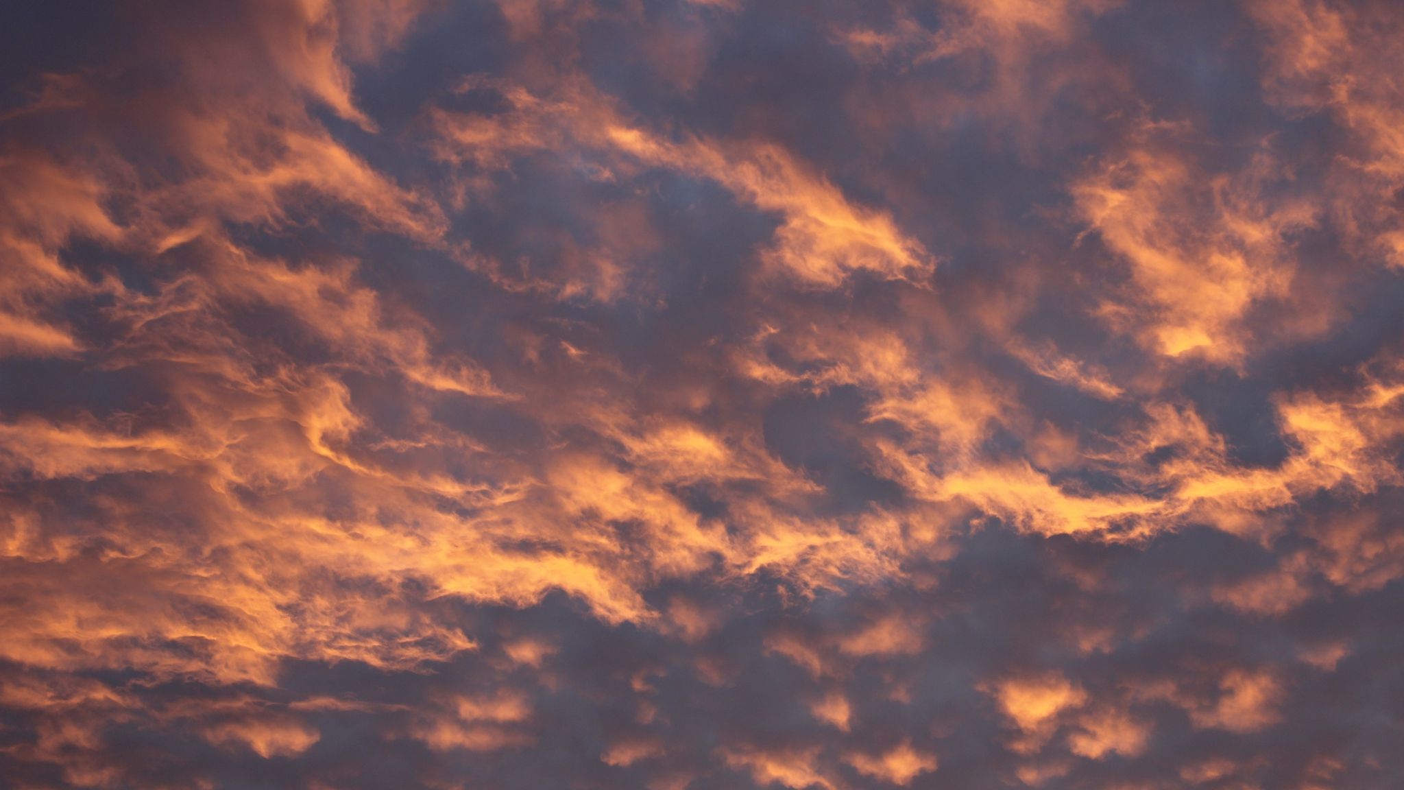 A sky at sunset with clouds in orange and blue colors - 2048x1152, YouTube