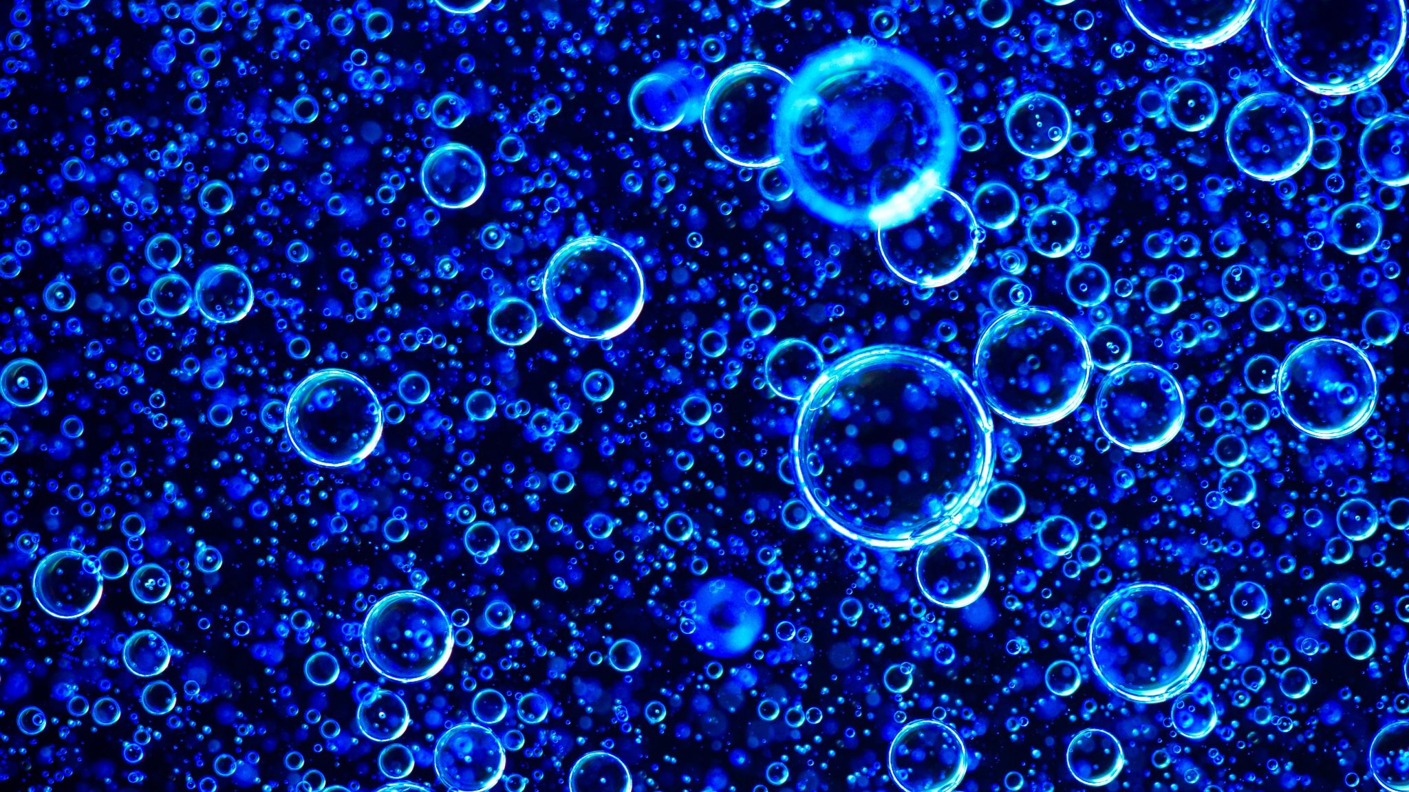 A blue background with bubbles - 2048x1152
