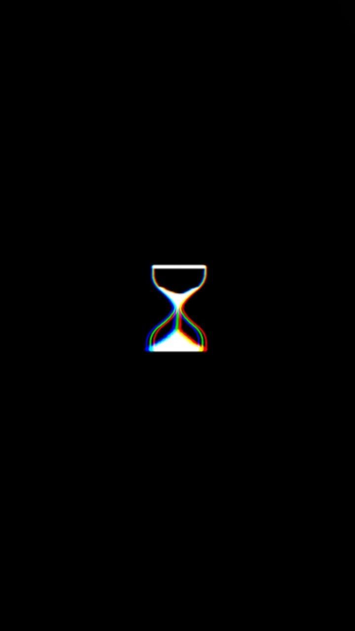 A black background with an hourglass on it - Black glitch