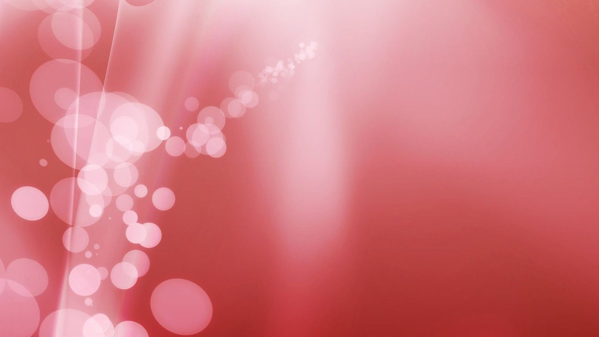 A pink background with bubbles and dots - Light red