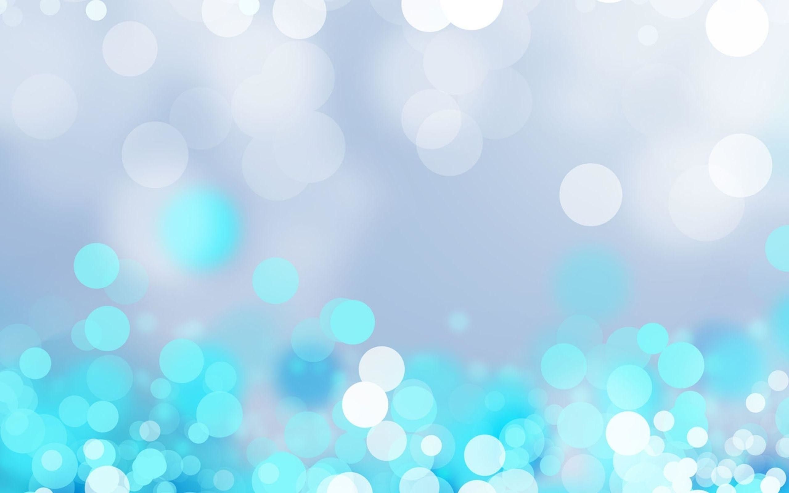 A blue and white bokeh background - 