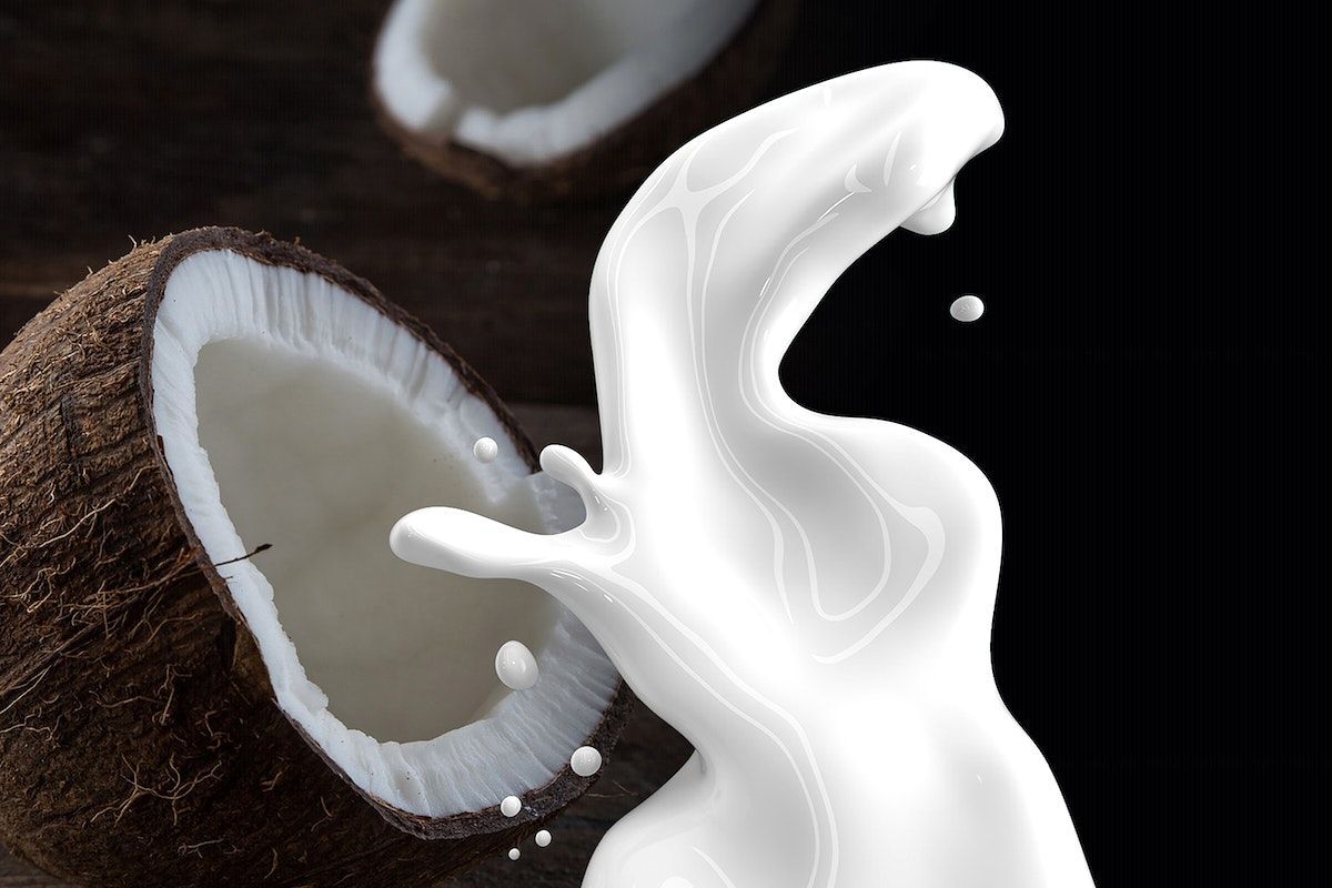 A close up of milk and coconut - Coconut