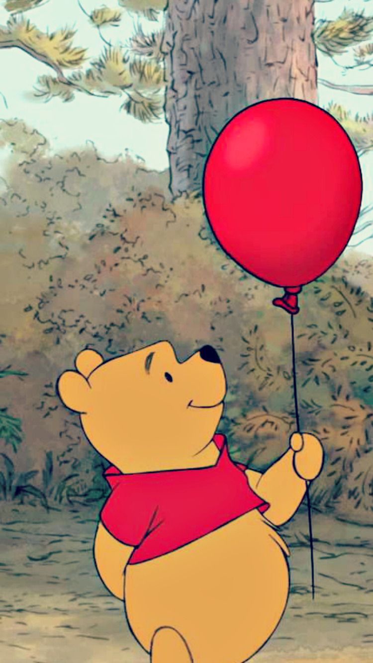 Winnie the Pooh holding a red balloon - Winnie the Pooh