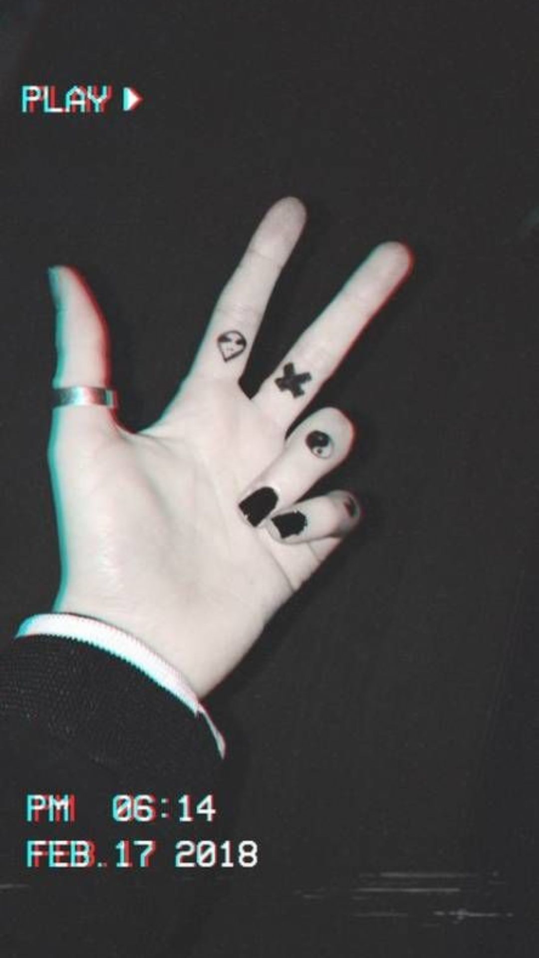 Aesthetic phone wallpaper of a hand making the peace sign with symbols on each finger. - Sad