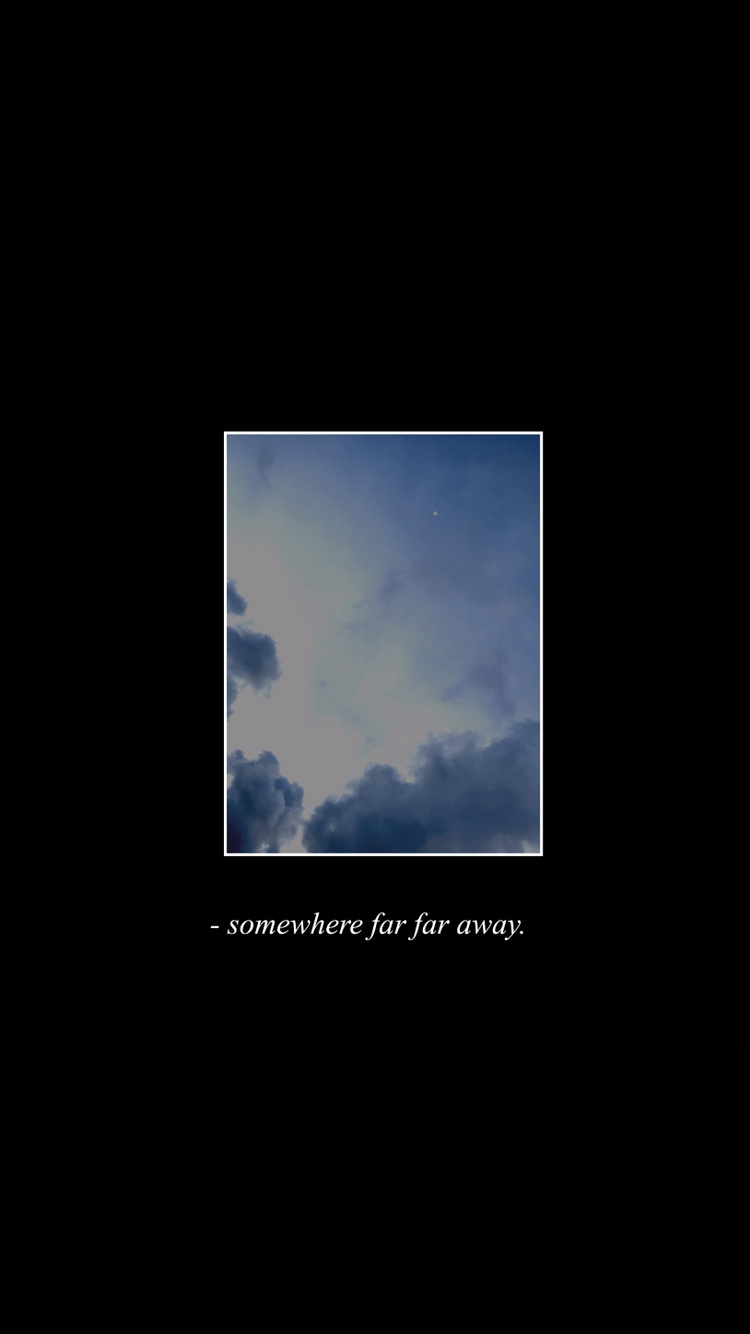 A black screen with a blue sky and clouds in the middle and the words 