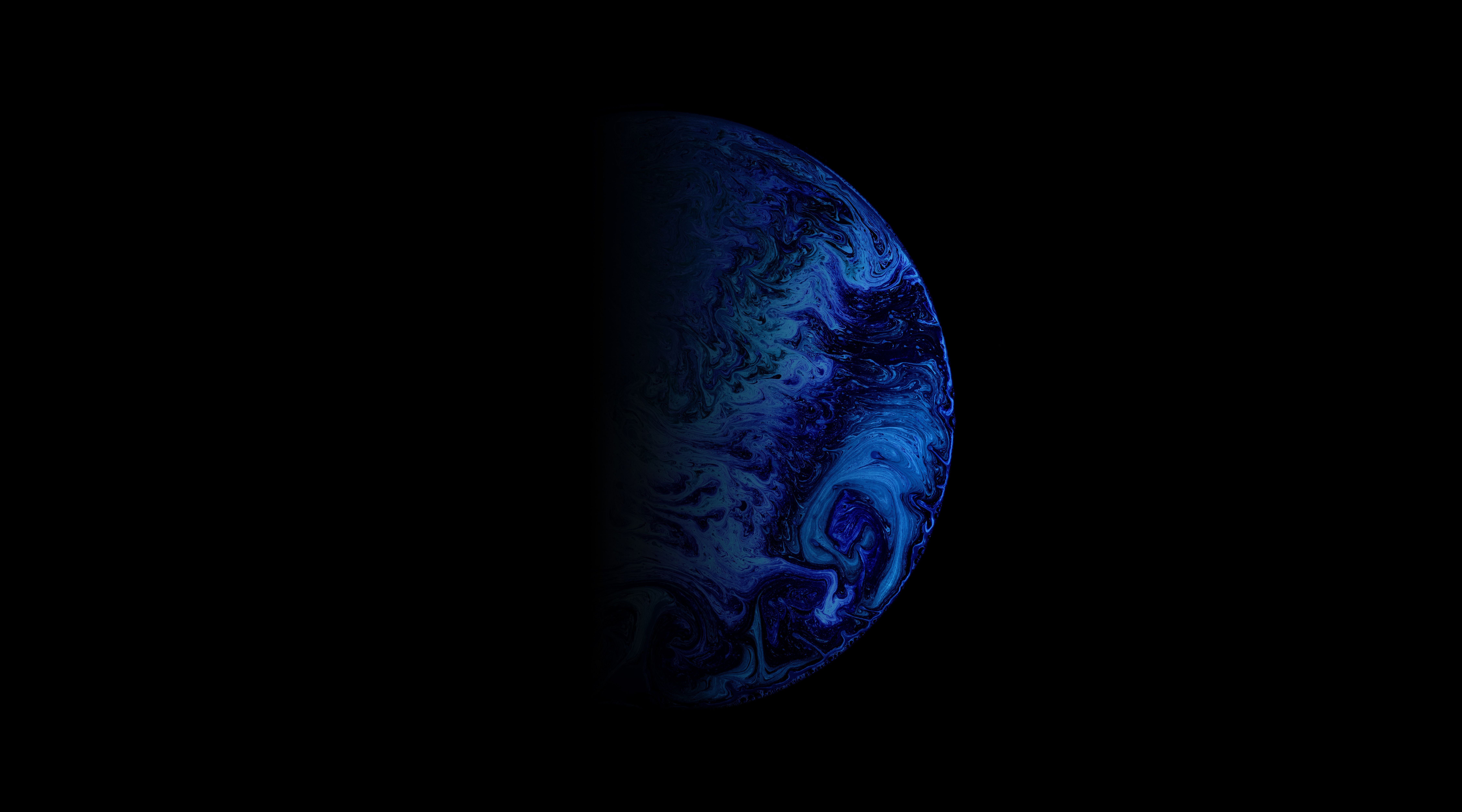 A black and blue planet in the dark - Planet
