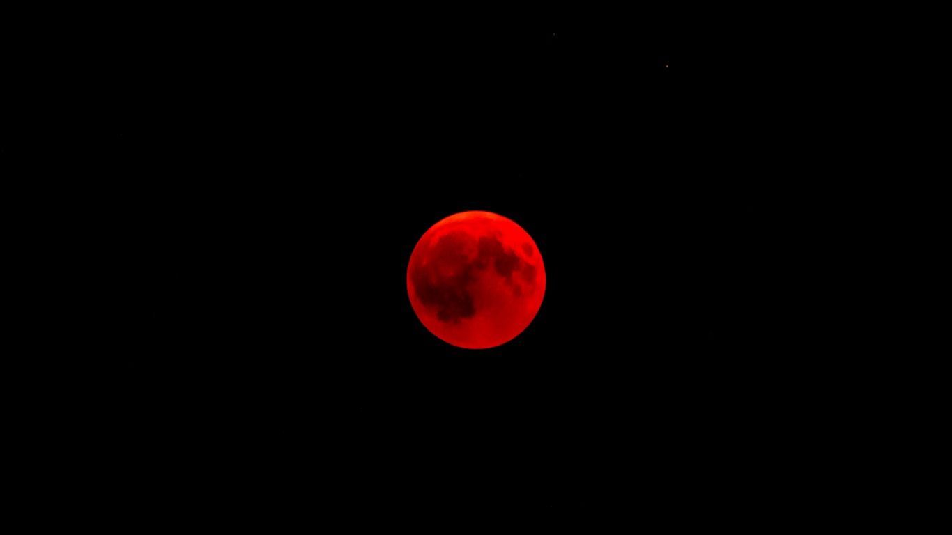 A red full moon in the sky - 1366x768