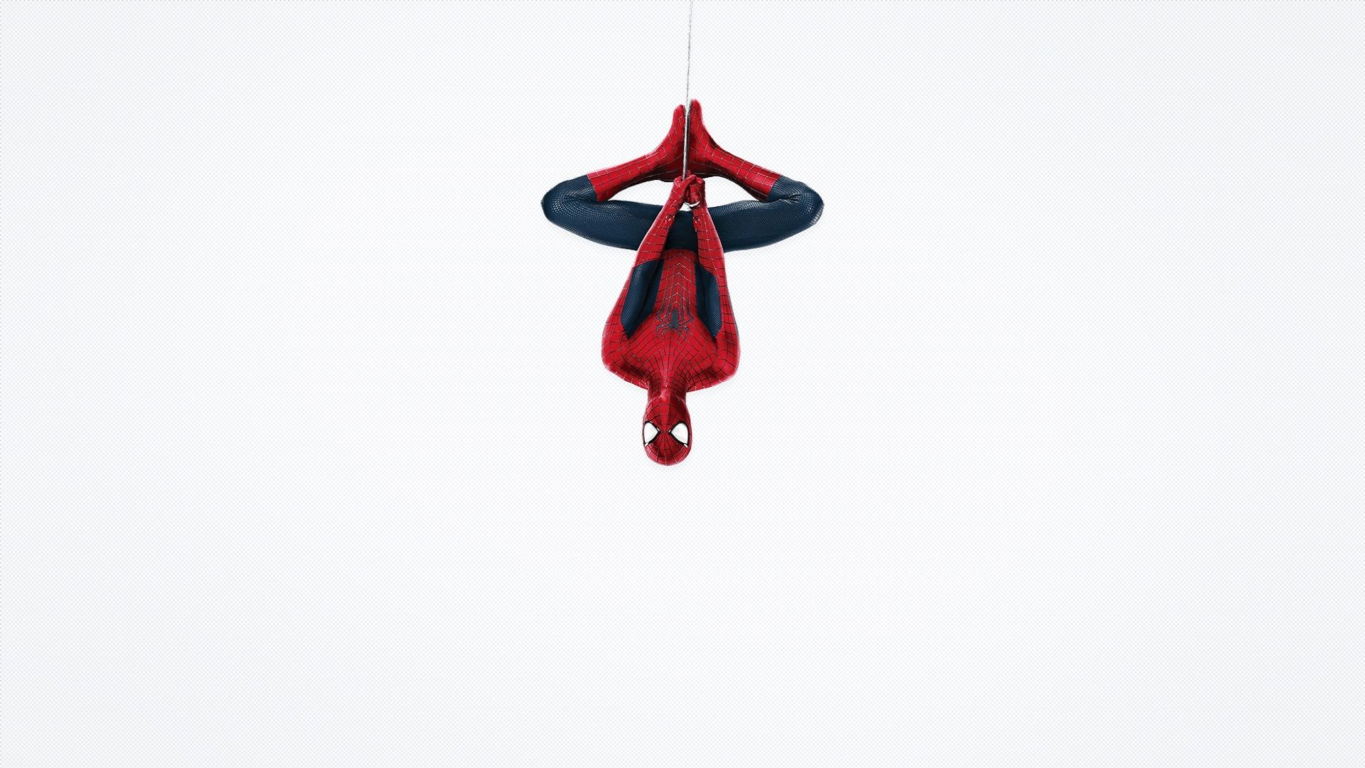 Spider-Man hanging upside down from a web - 