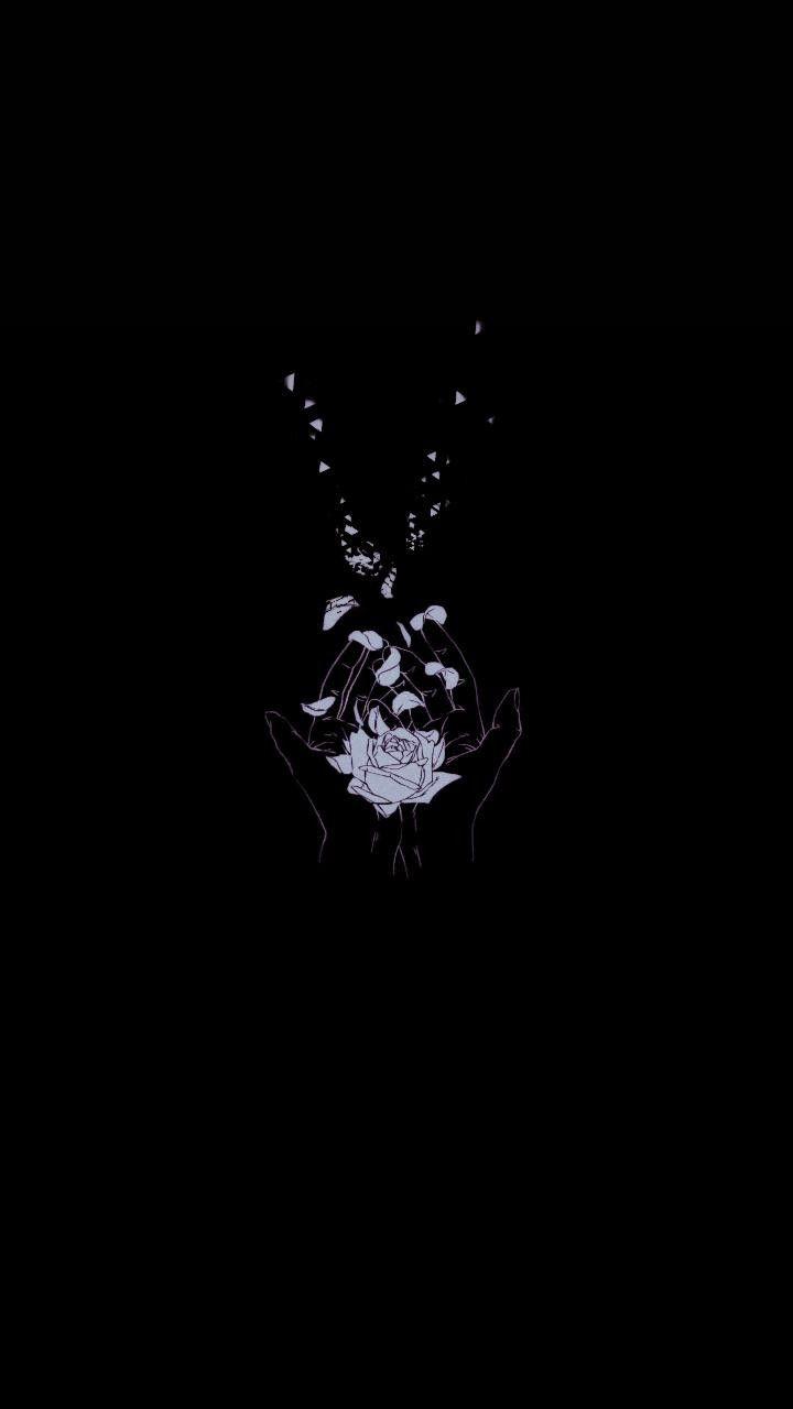 Hands holding a flower in the dark - Black