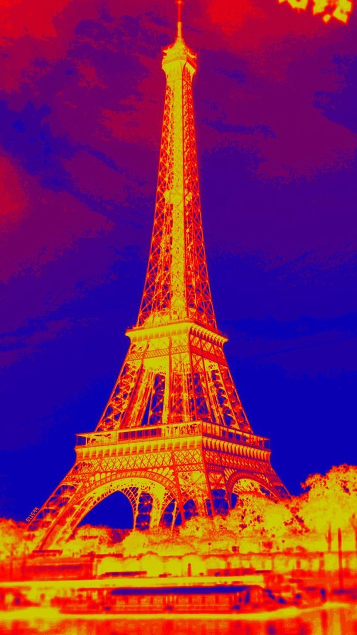 The Eiffel Tower in Paris, France, as seen through a thermal imaging camera. - Colorful