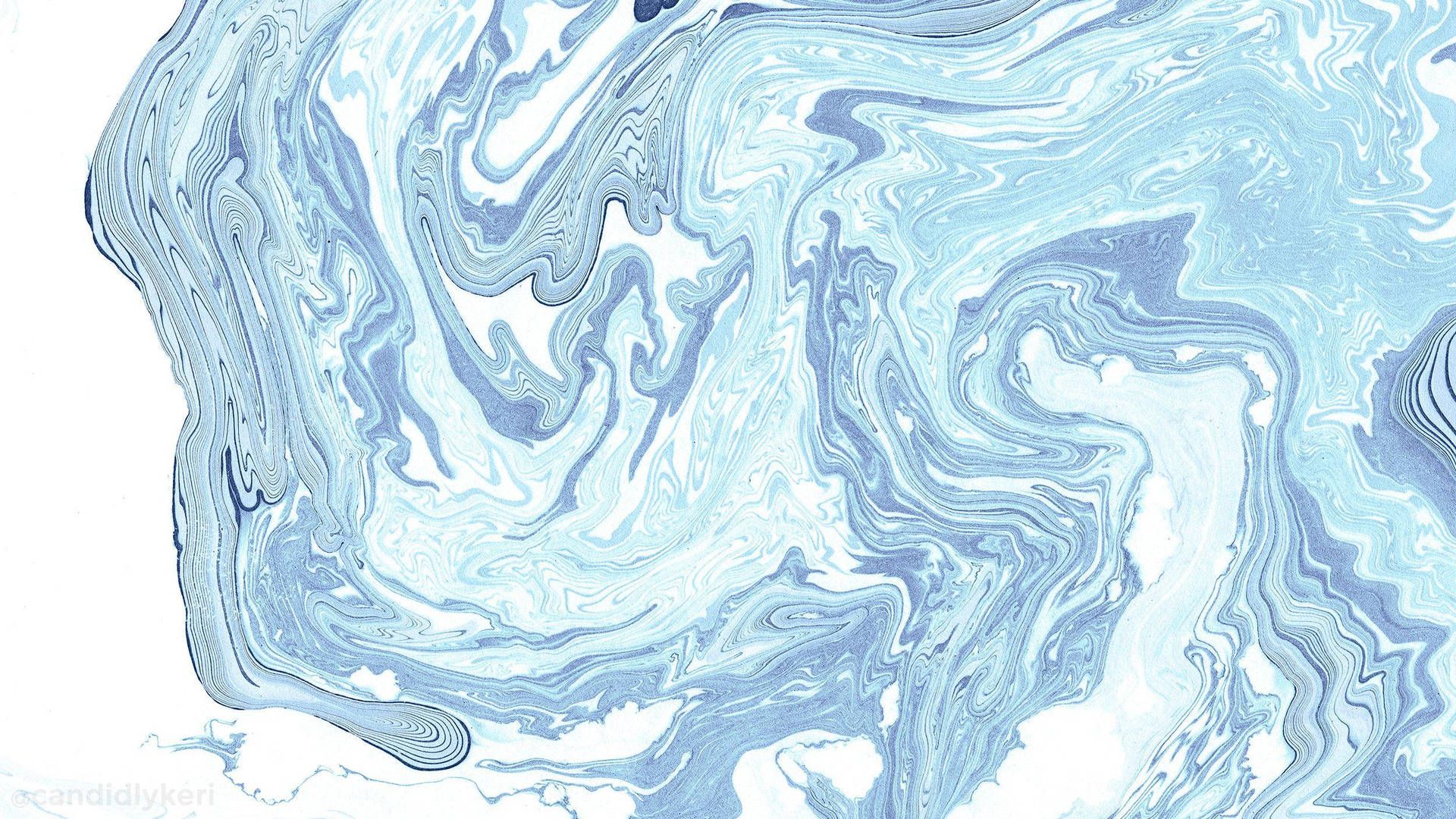 A close up of some blue and white marble - MacBook