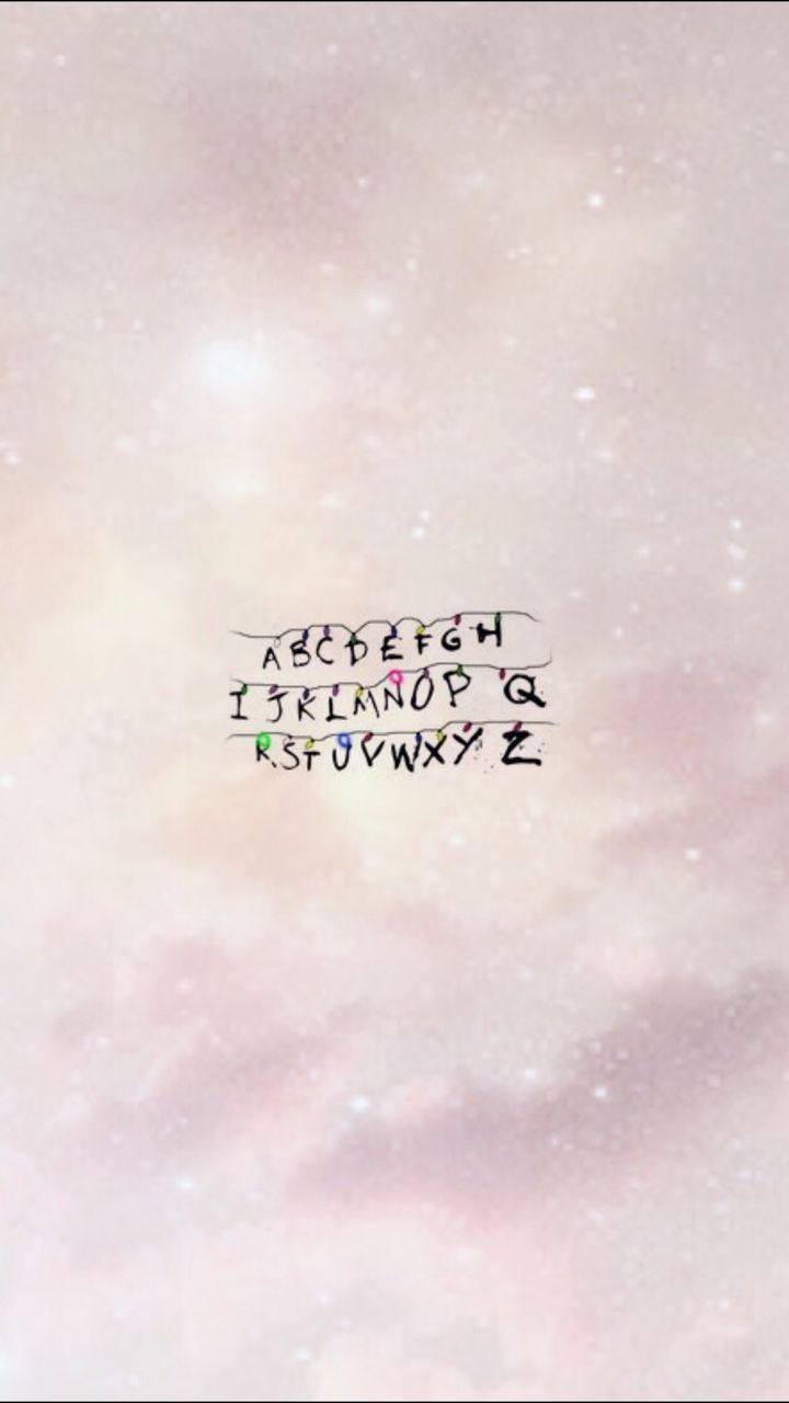 A close up of the sky with some letters - Stranger Things