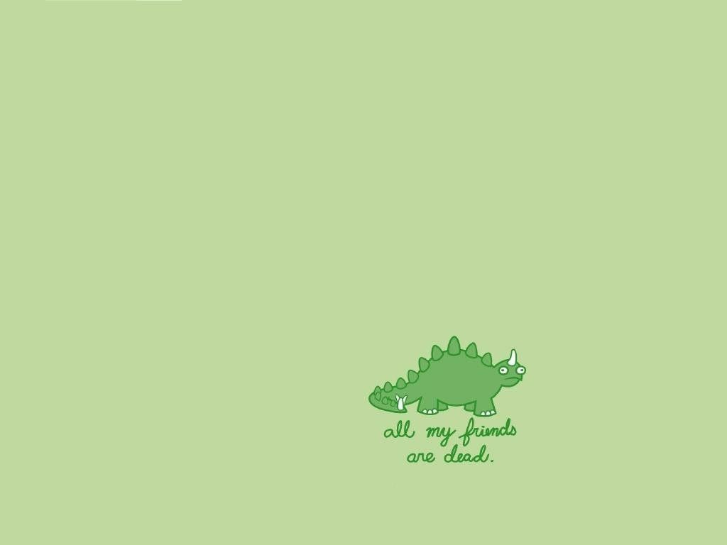 A green dinosaur with the words 