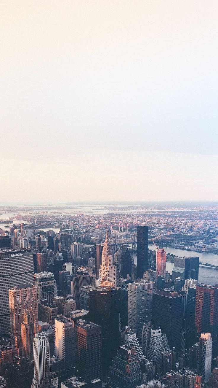 The skyline of New York City, as seen from the top of the Empire State Building. - New York
