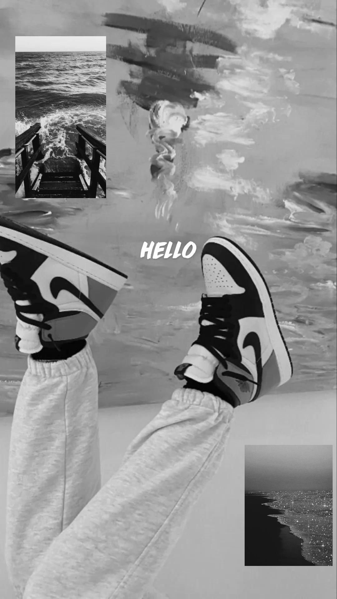 Aesthetic background with a pair of feet wearing black and white Nike sneakers - Shoes, Air Jordan