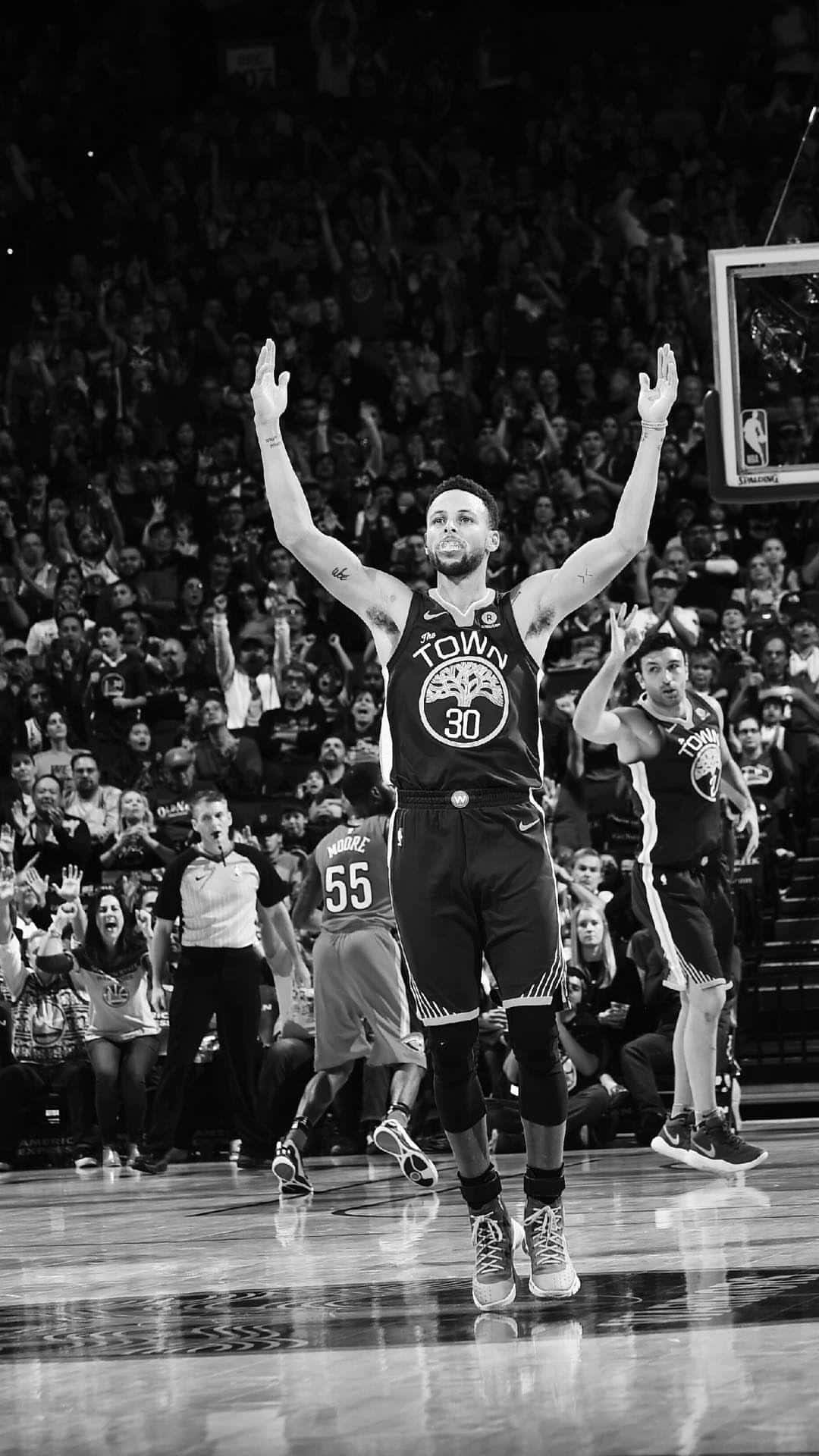 A black and white photo of basketball player celebrating - NBA