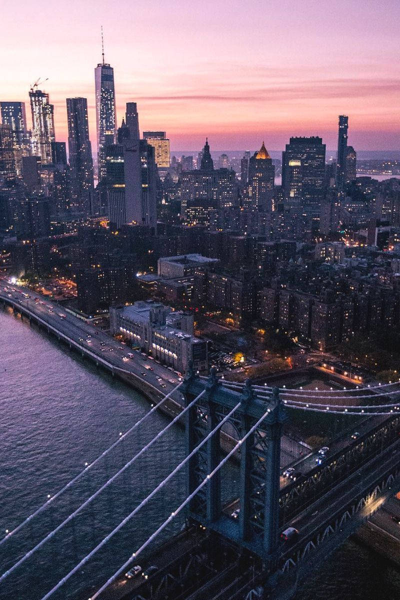 A city skyline with the sun setting - New York