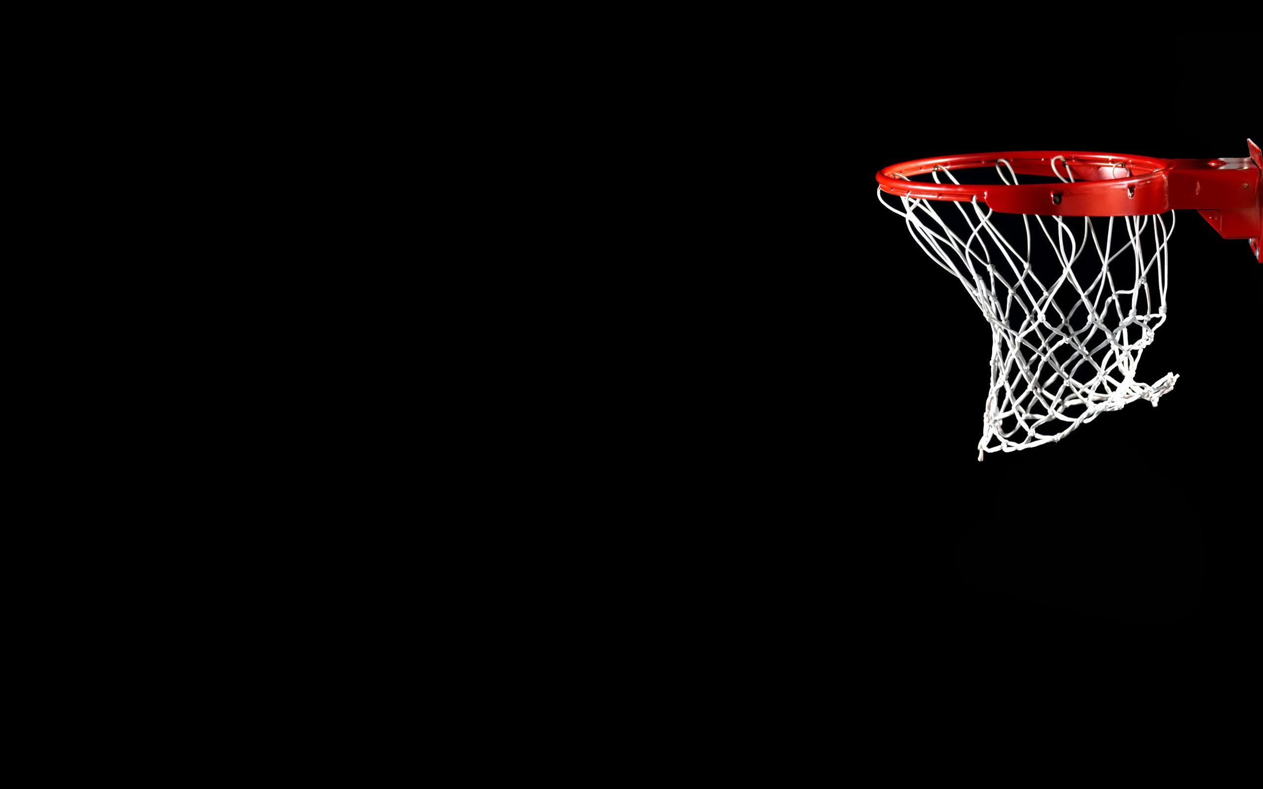 A basketball hoop on a black background - Basketball