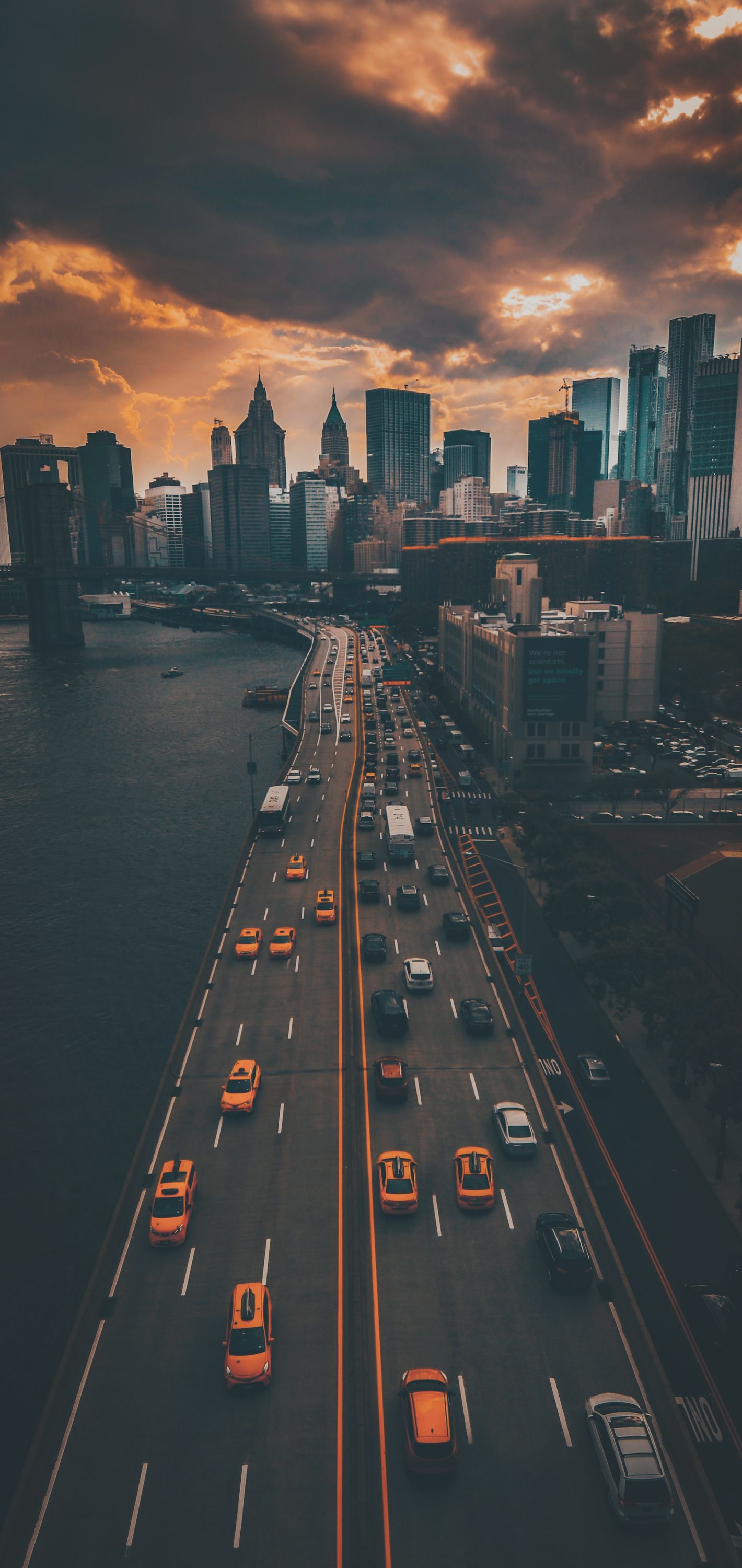 A city with a river, highway, and skyscrapers - New York, city