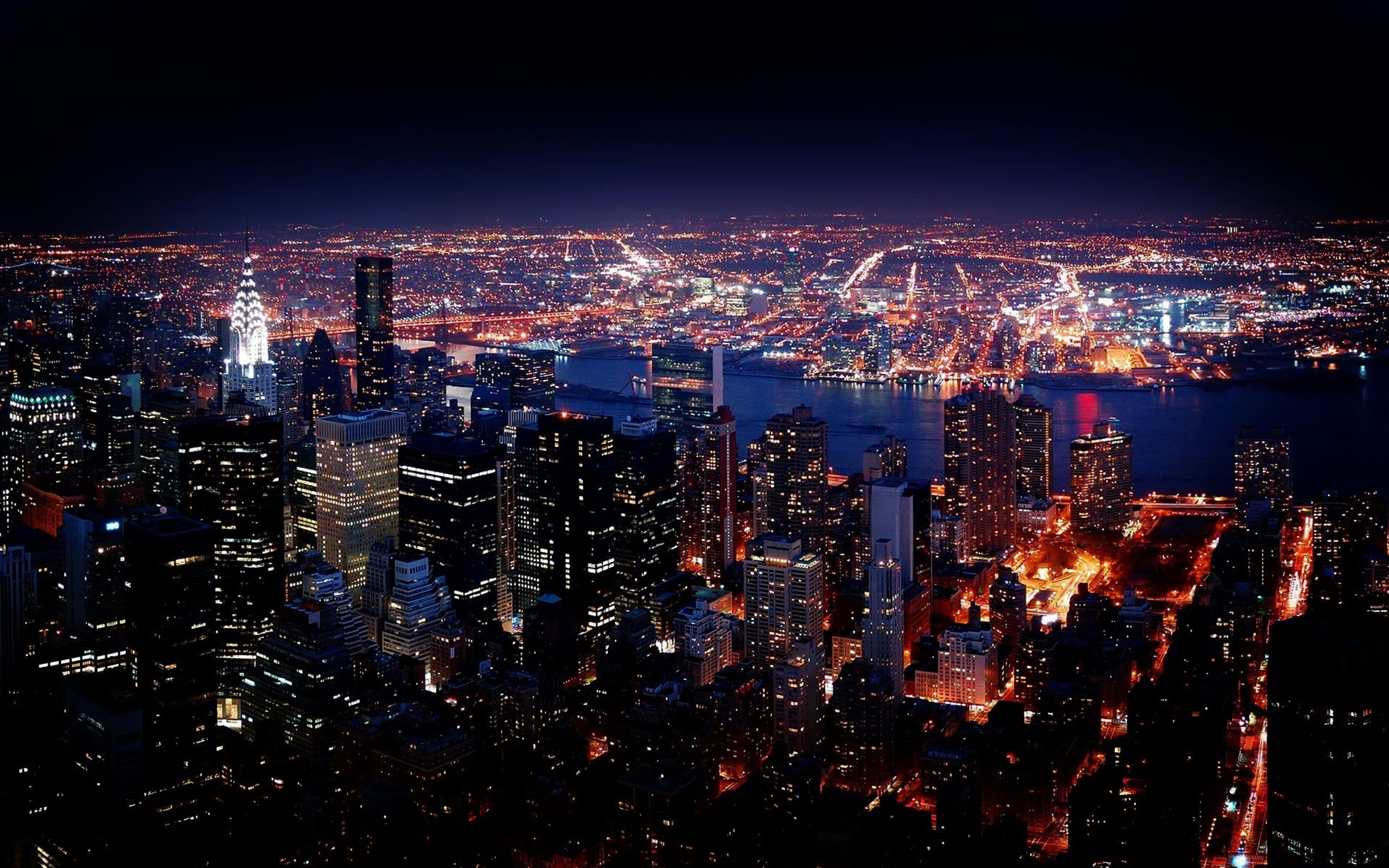 A city at night with lights from buildings - New York