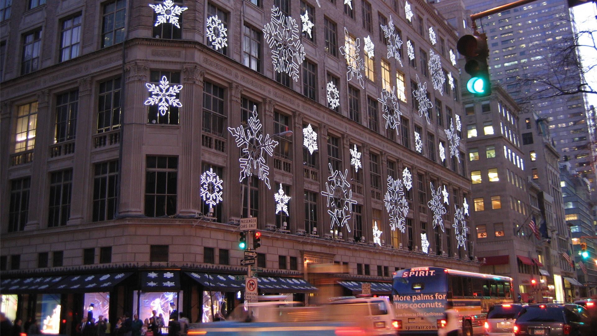 A large building with Christmas decorations on it. - New York