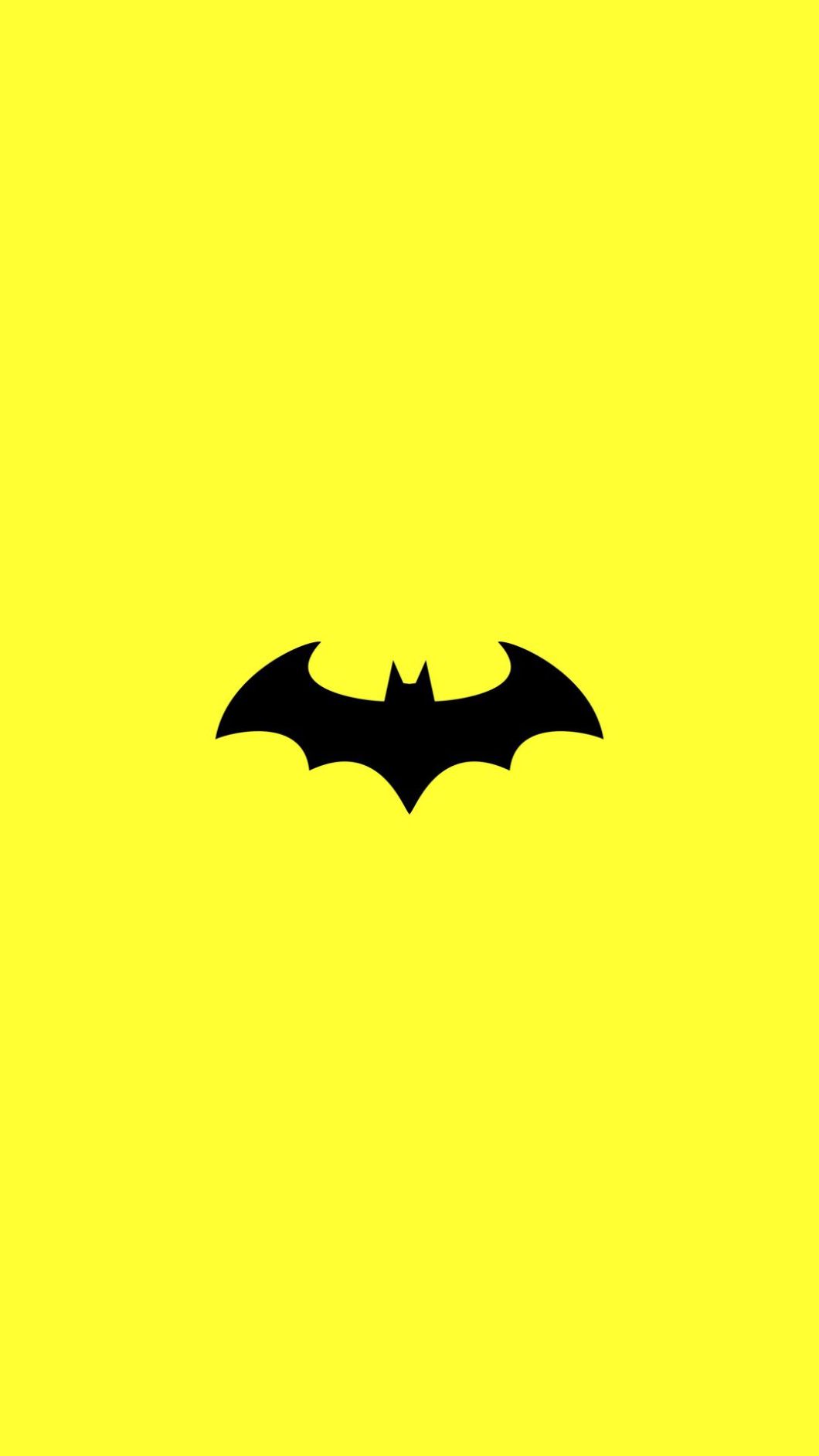 A black bat on a yellow background - Batman