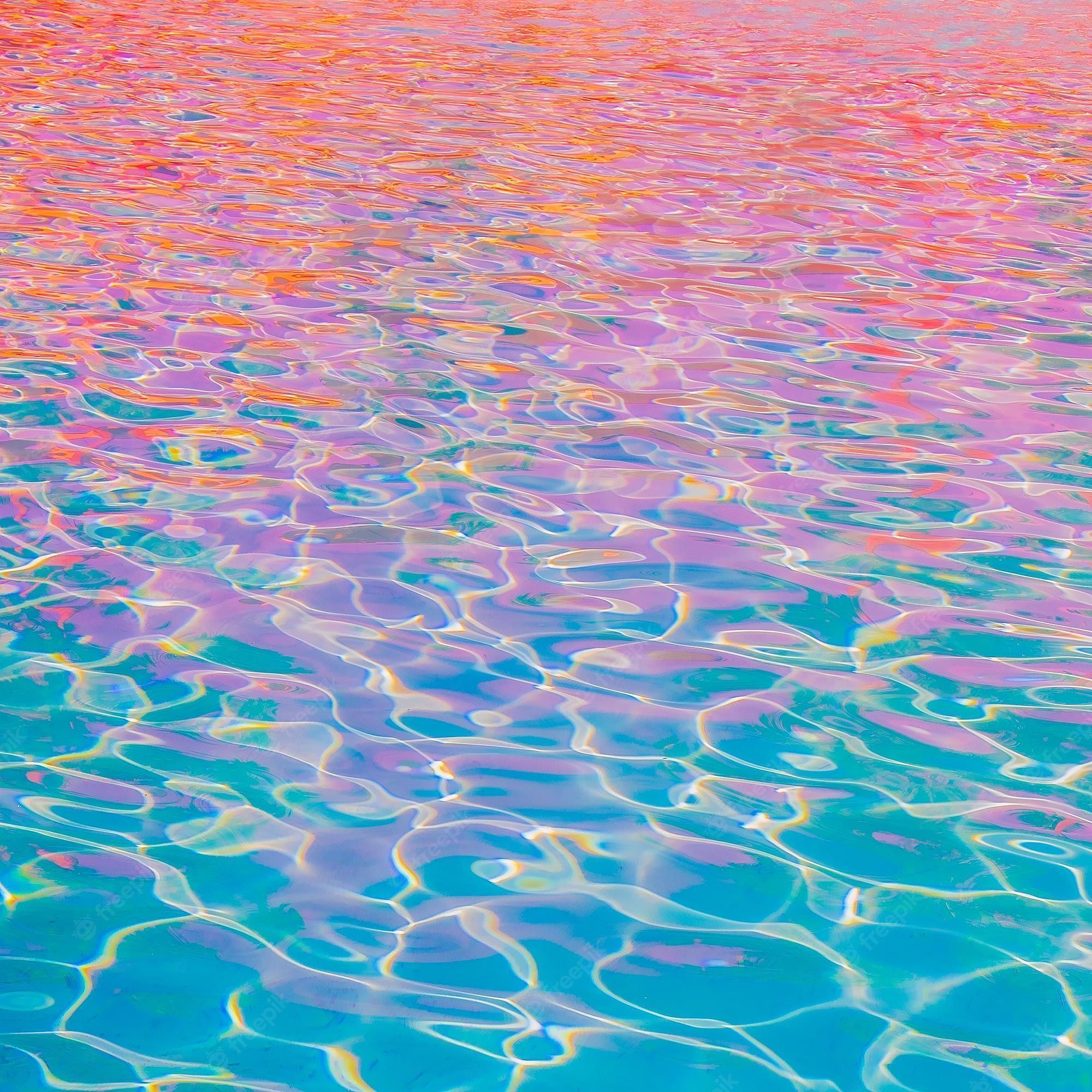 A pool with a pink and blue reflection in it - Vaporwave, swimming pool